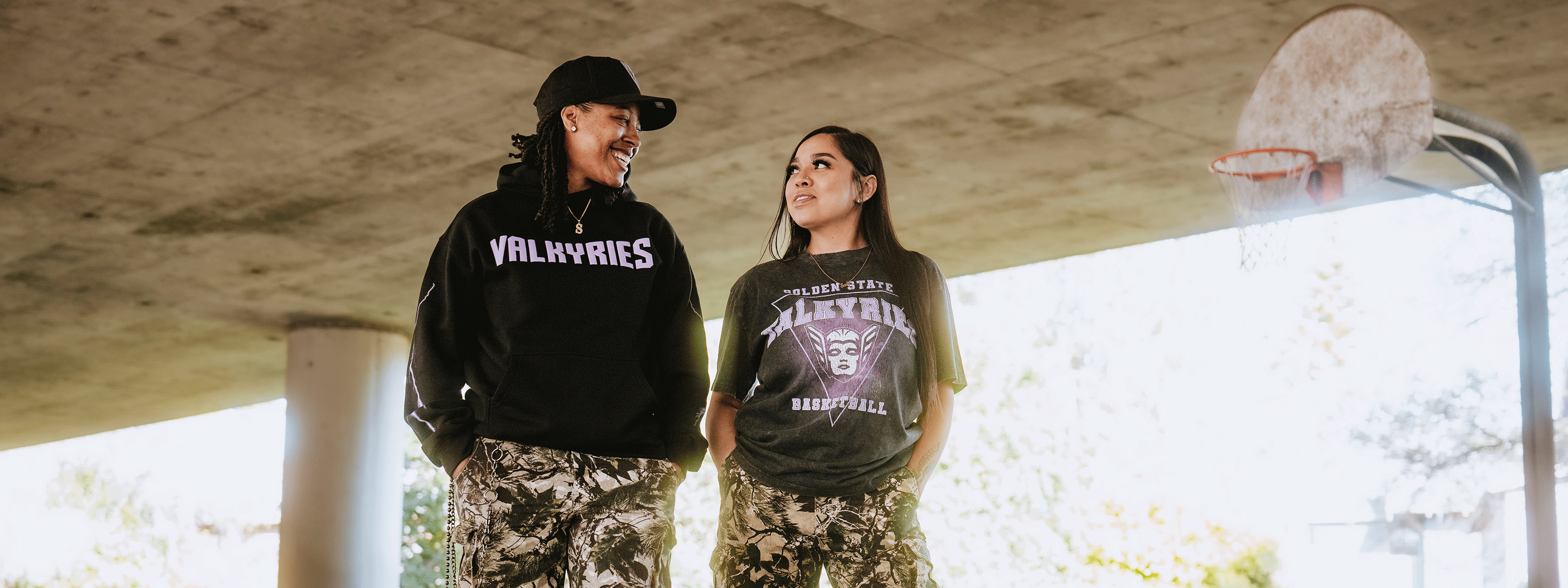 Purple, angular logo of the "Golden State Valkyries" on a black background. The geometric design features a stylized triangle with radiating lines, enhancing the bold text above.