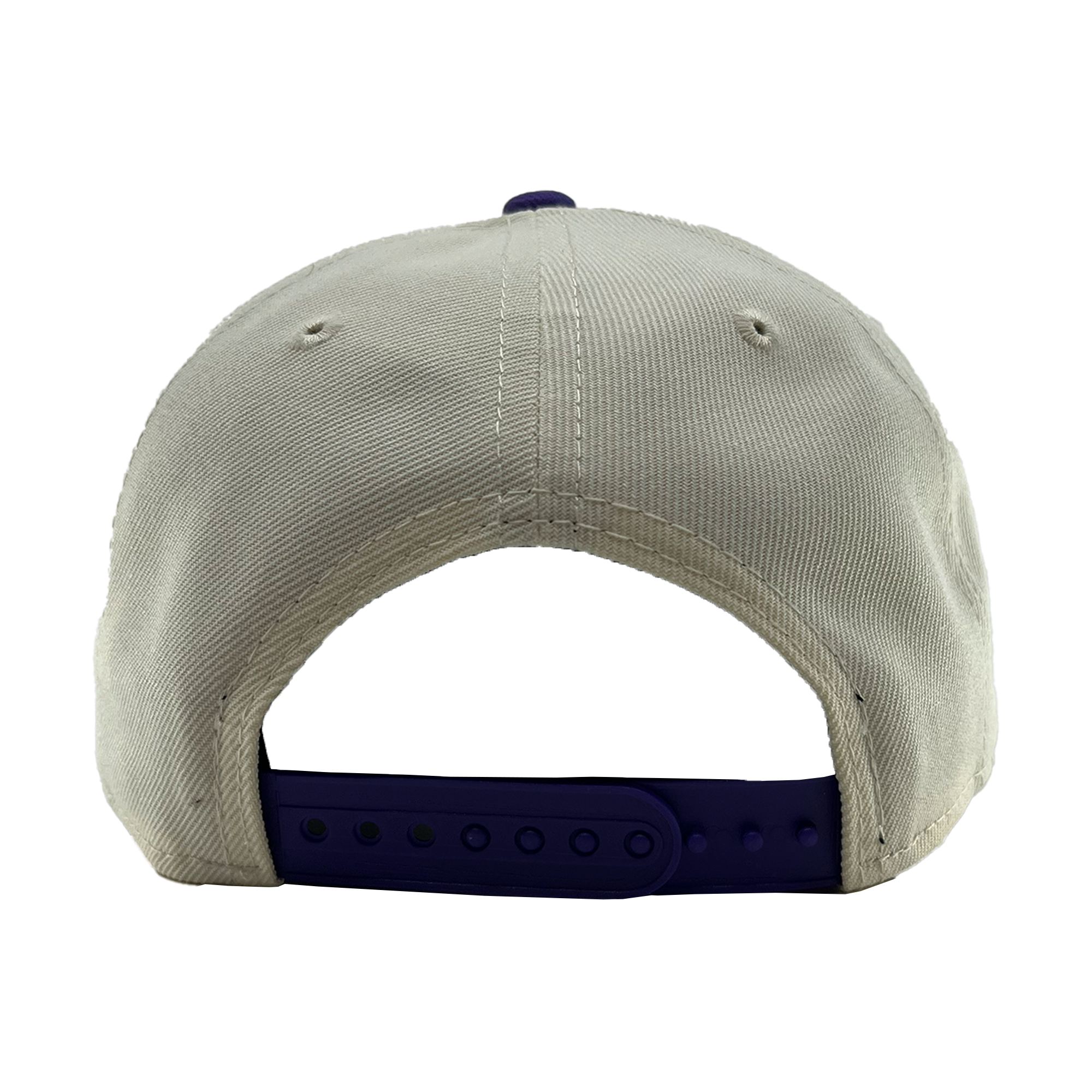 A close-up of the beige GSV 9FORTY AF 2 Tone adjustable hat by GSV shows visible stitching, two embroidered eyelets, and classic dark blue snapback buttons—all set against a plain white background.
