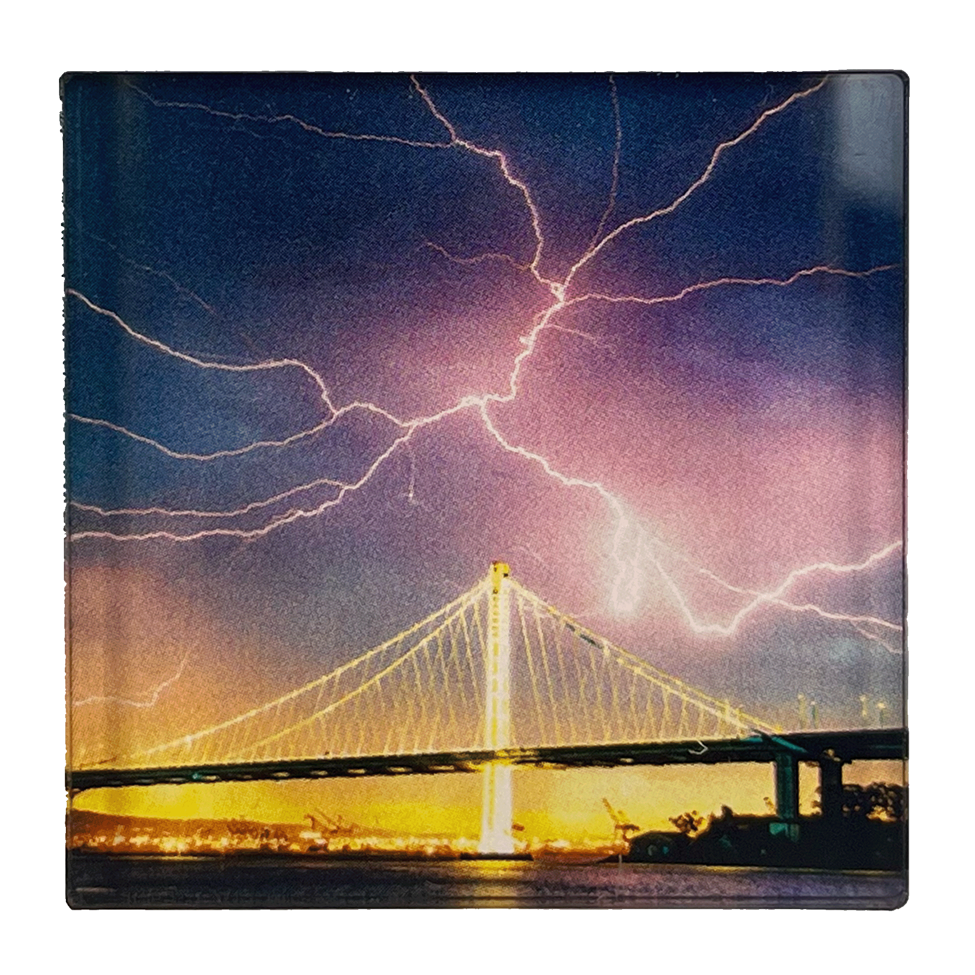 Image of lightning in night sky over Oakland bridge by photographer Vincent James.