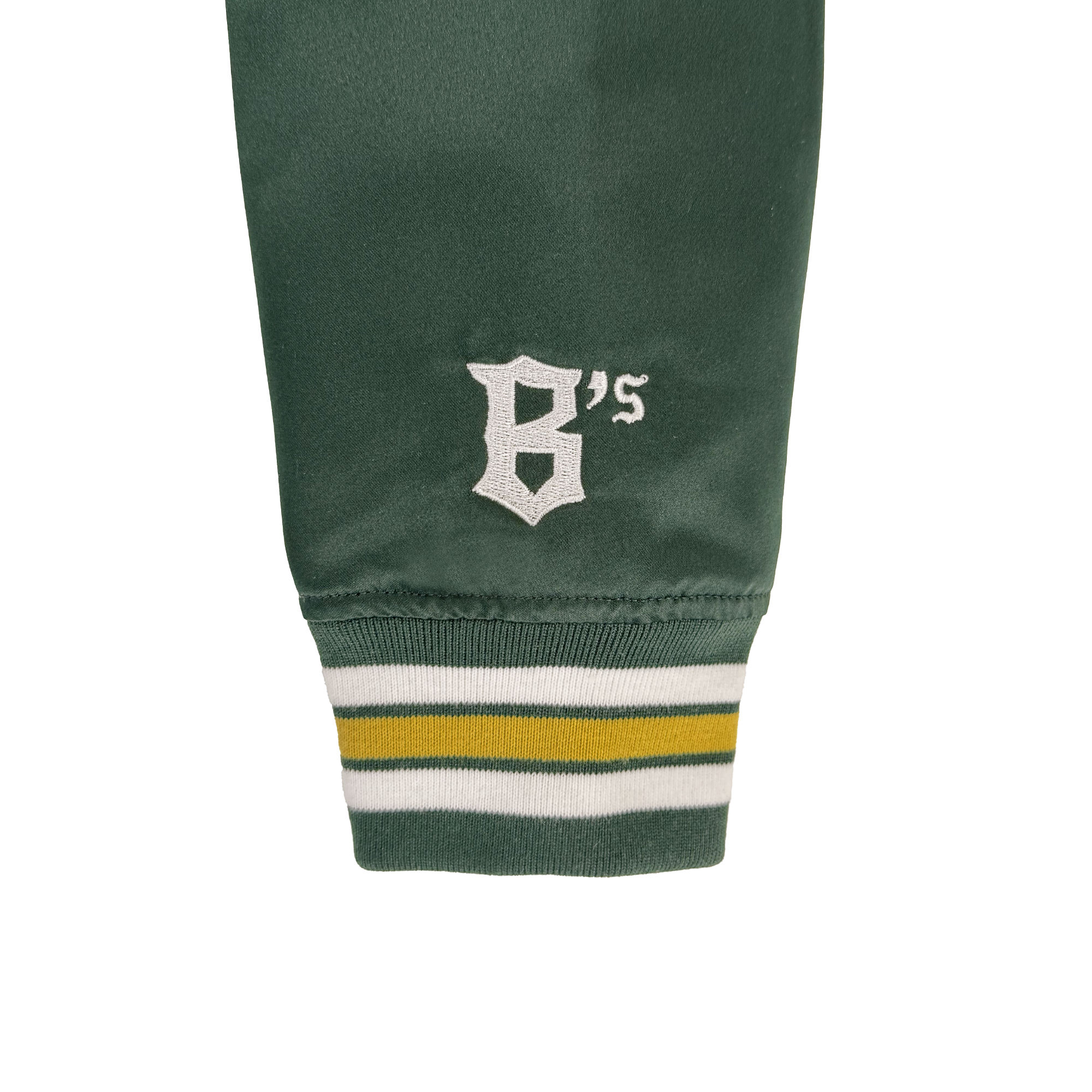 Close-up of the Oakland Ballers Satin Jacket by Oakland Ballers, showing a dark green sleeve with white "B’s" old English embroidery and an elastic cuff with white, yellow, and dark green stripes against a white background.
