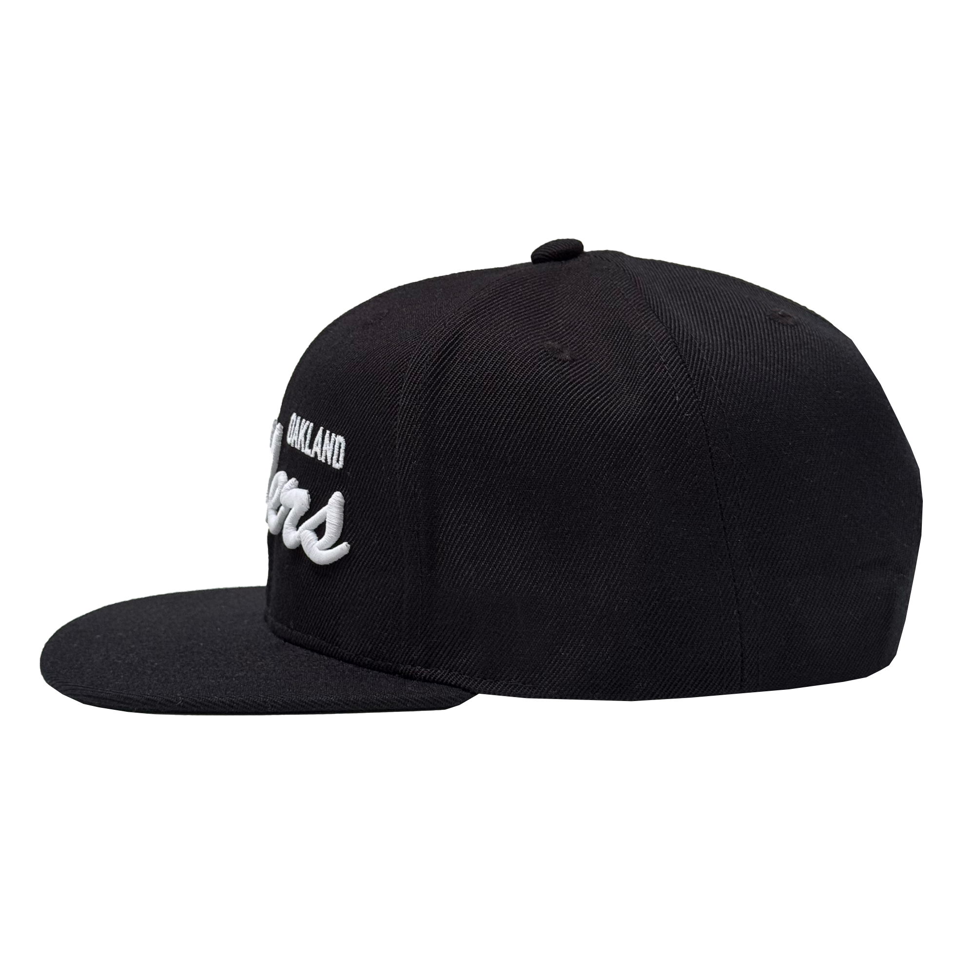 The Oakland Ballers Script Snapback by Oakland Ballers is a black snapback hat with a flat brim and raised white embroidered Ballers script on the front, viewed from the side. It features an adjustable snapback with no extra logos or designs.
