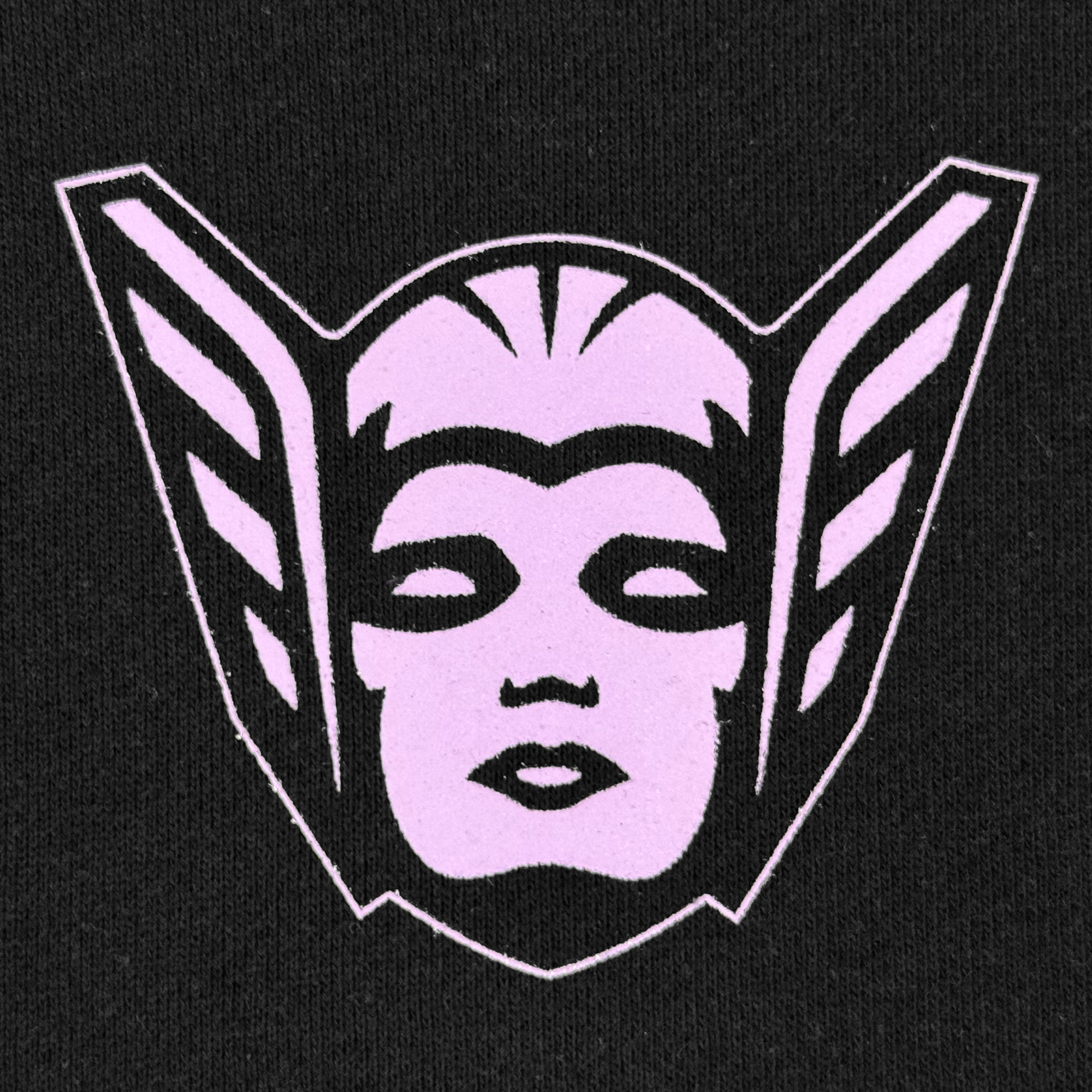 The GSV Renowned Hoodie by GSV features a stylized pink face with closed eyes and lips, bold black outlines, and two wing-like shapes on a sleek black background—ideal for any fan of the Golden State Valkyries.