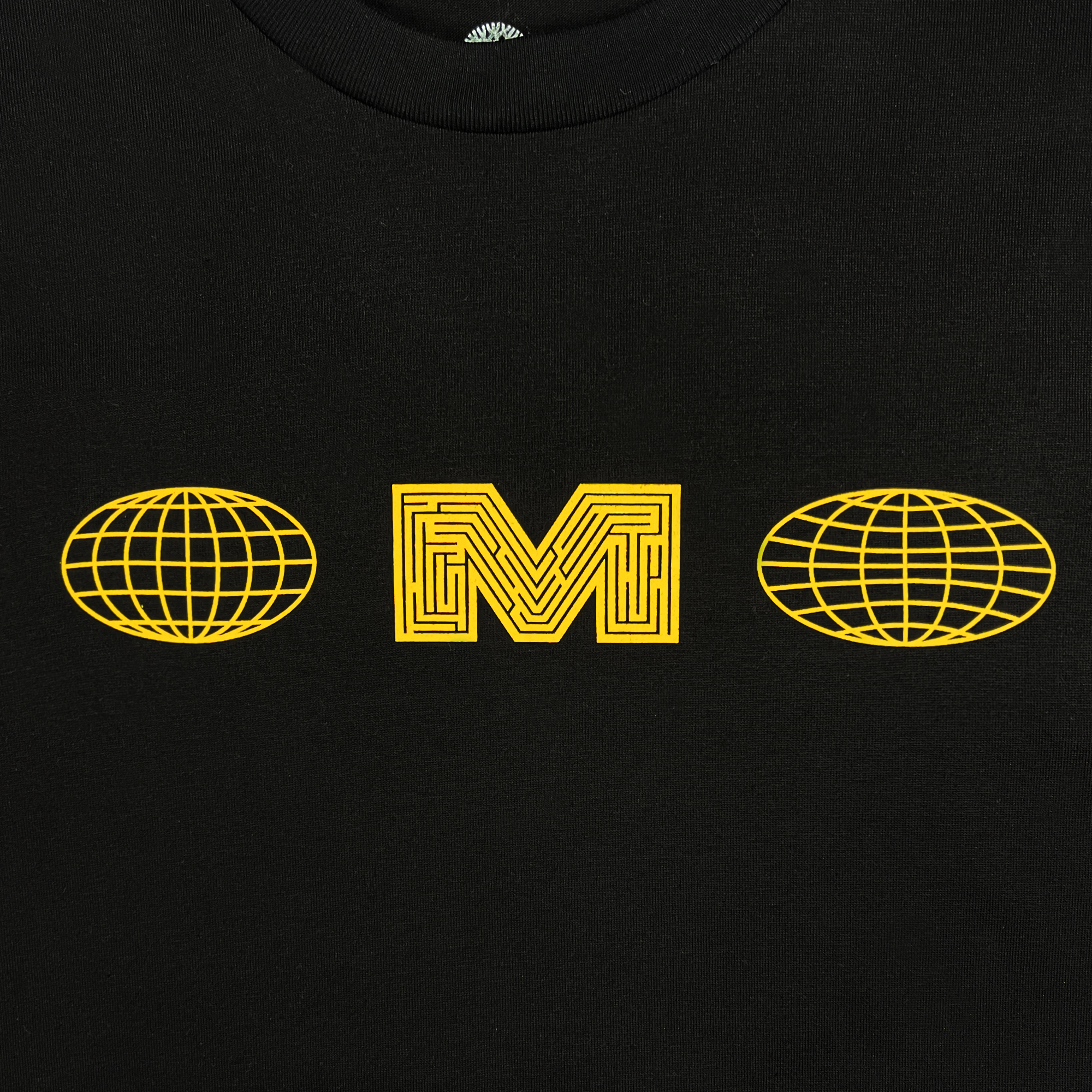 Front detail of black long sleeve t-shirt with Macarthur Maze logo.