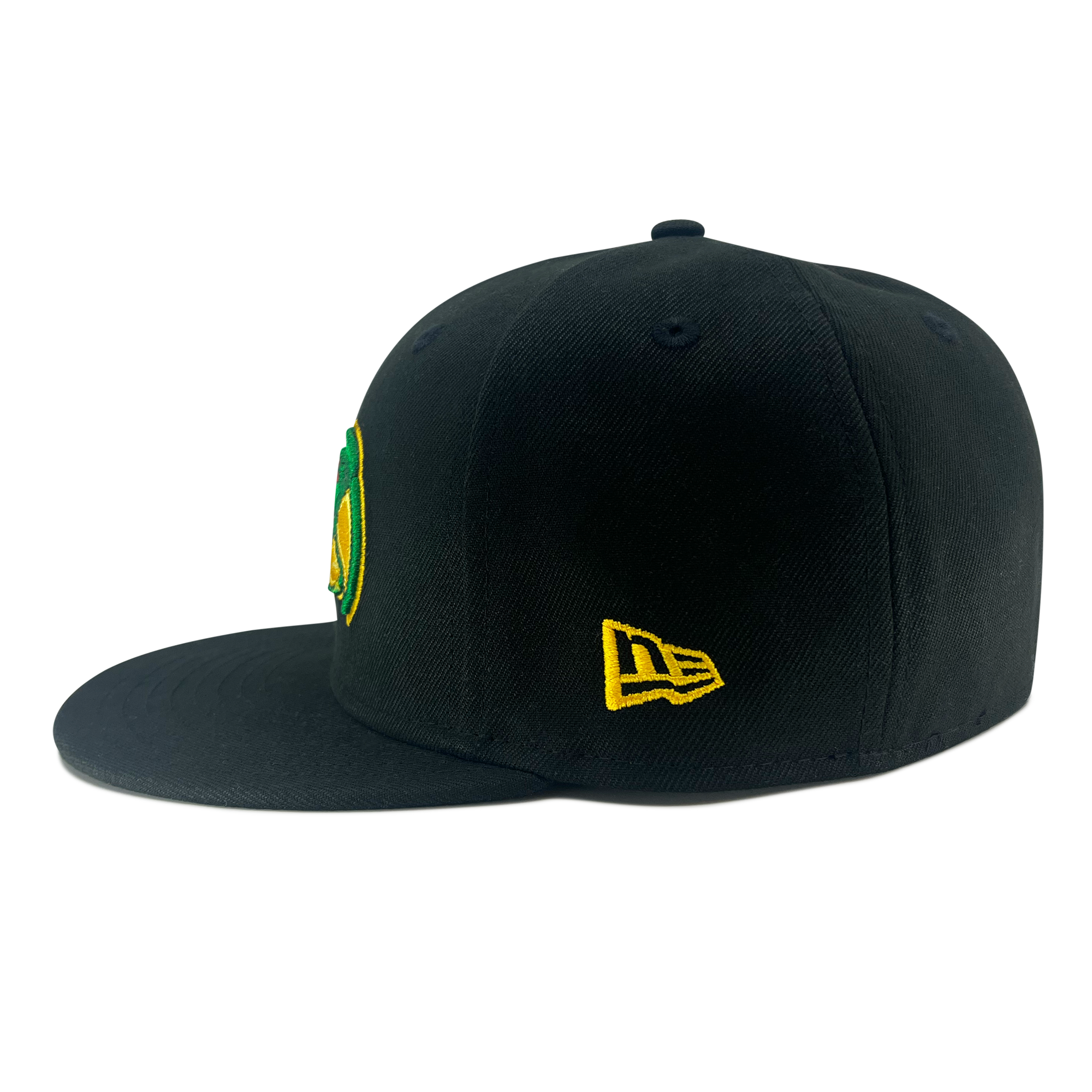 Side view of a New Era Pericos ALT 59FIFTY fitted black cap by Retail Vendors, showcasing a vibrant, stitched emblem of yellow and green on the front left panel. A small, yellow New Era logo is stitched on the right side panel. The 59FIFTY cap features a flat brim and has no visible adjustment mechanism at the back.
