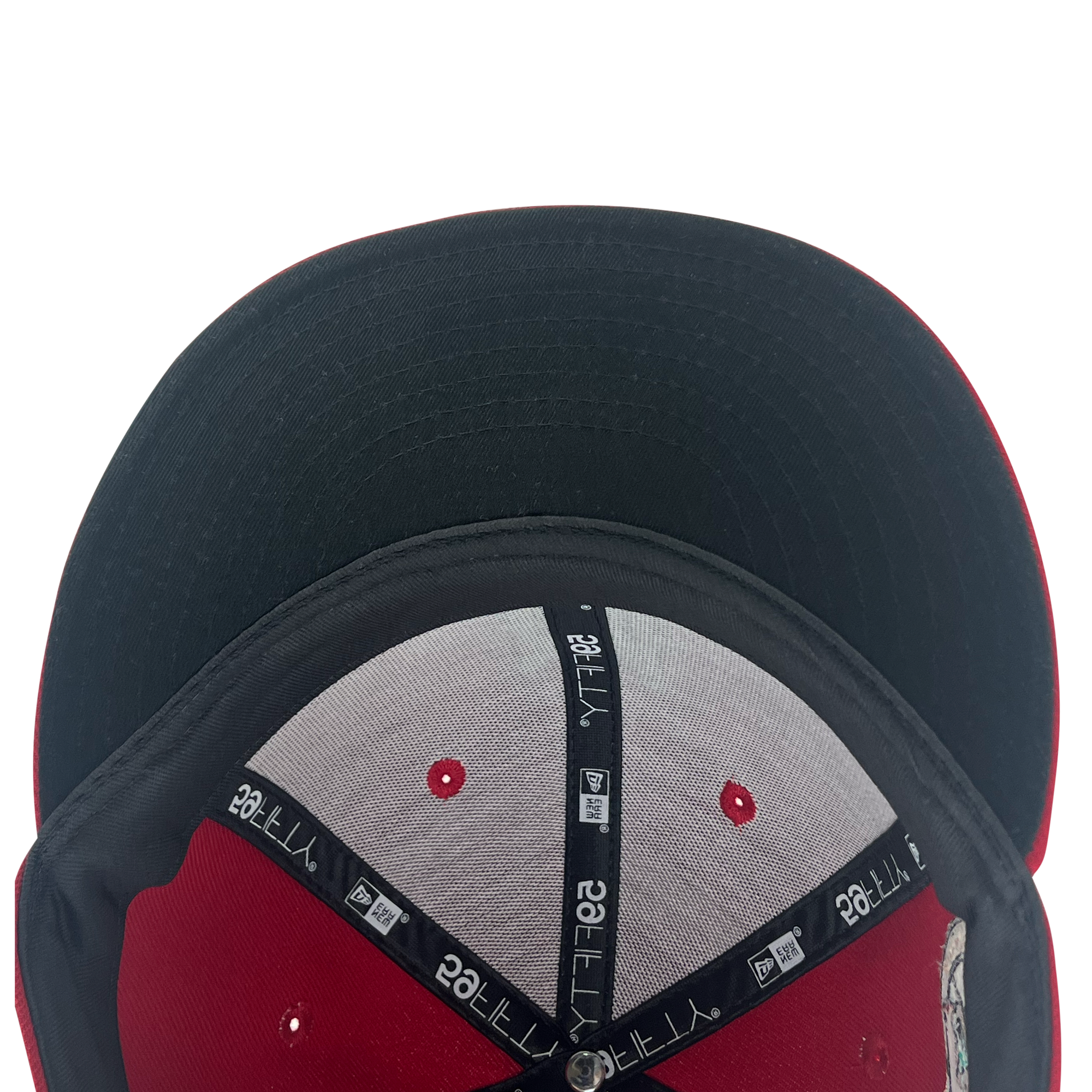 View under bill of red 59fifty fitted hat with Diablos logo in white embroidery.