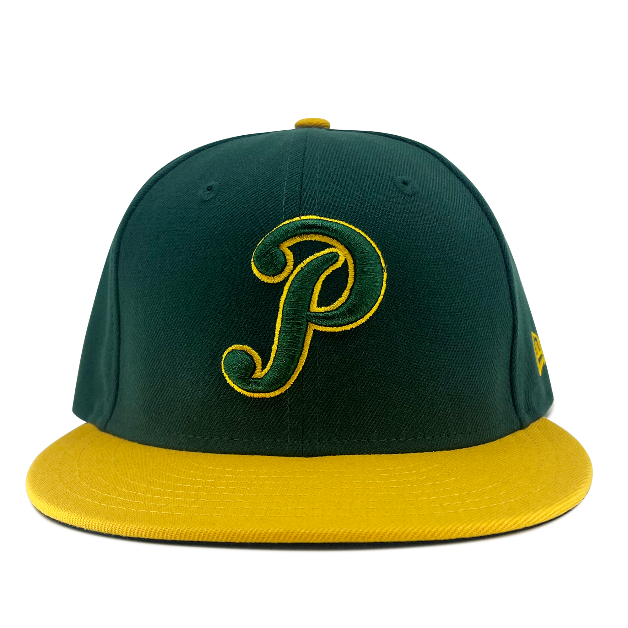 The New Era Pericos Home 59FIFTY Cap by Retail Vendors features a green crown with a yellow brim and a yellow button on top. The front showcases a large, stylized yellow letter "P" outlined in green. Made of high-quality fabric, this fitted cap is perfect for fans looking to show off their style. The background is plain white.