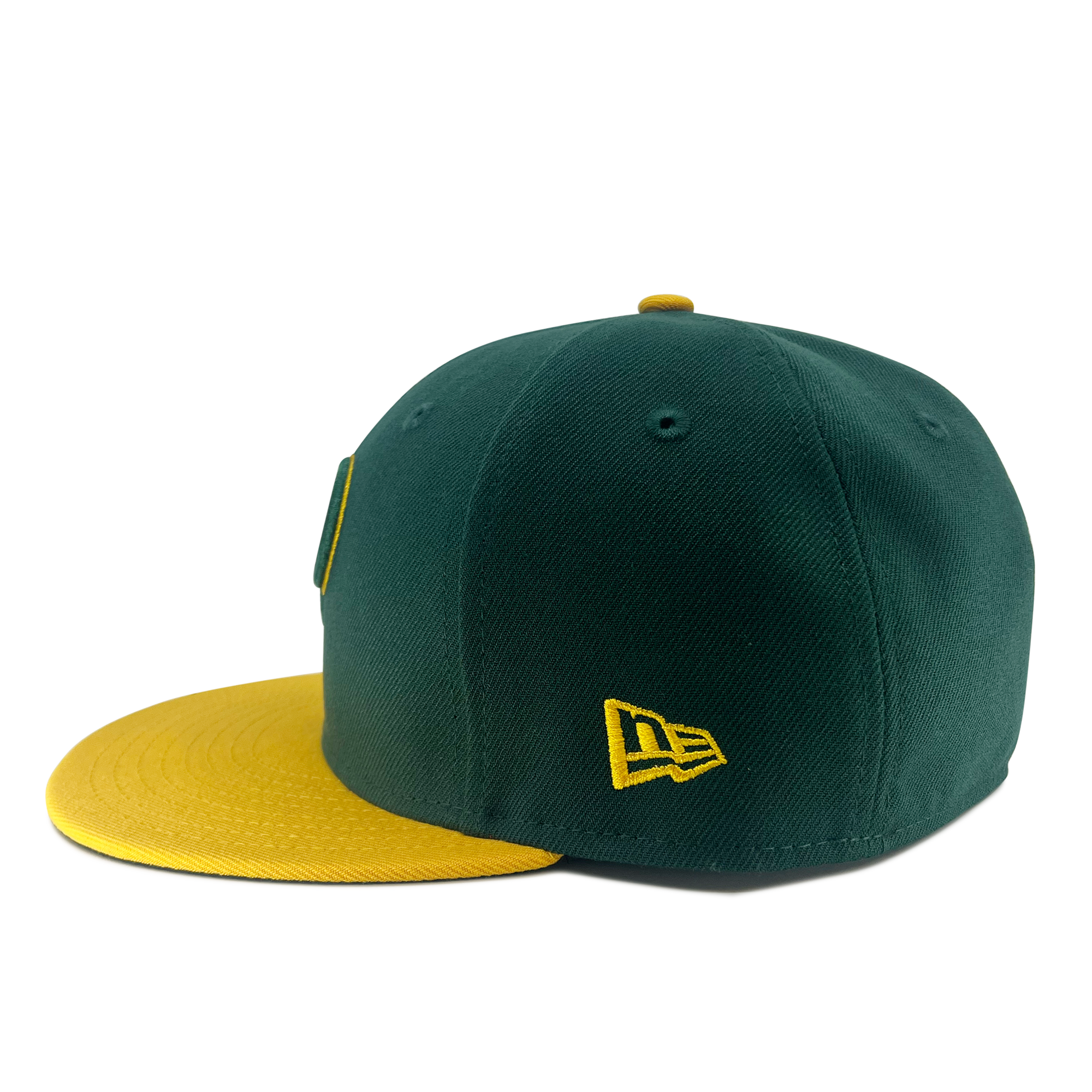 The New Era Pericos Home 59FIFTY Cap by Retail Vendors is displayed, showcasing its dark green color complemented by a yellow brim. This fitted hat features a yellow embroidered New Era logo on the side and boasts a flat brim style. Made of smooth fabric, the cap's colors and design details are perfectly highlighted against the plain white background.