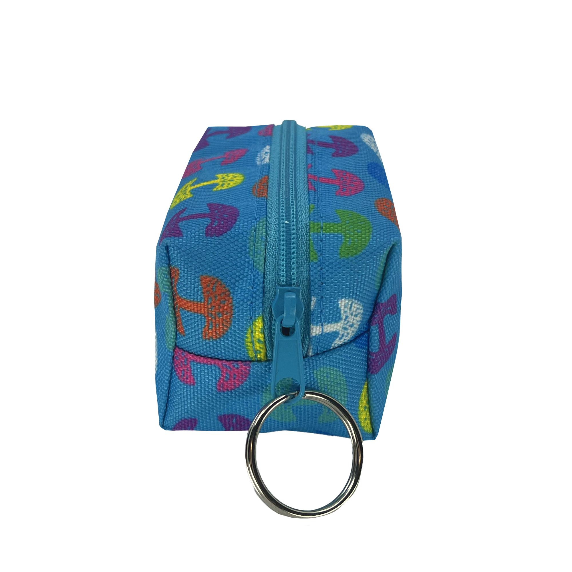 The Oaklandish Repeat Tree Mini Dopp by Oaklandish is a small, rectangular blue fabric pouch with a turquoise zipper running along the top. This mini keychain pouch features vibrant, multicolored umbrella patterns and has a silver keyring attached to one end of the zippered compartment.
