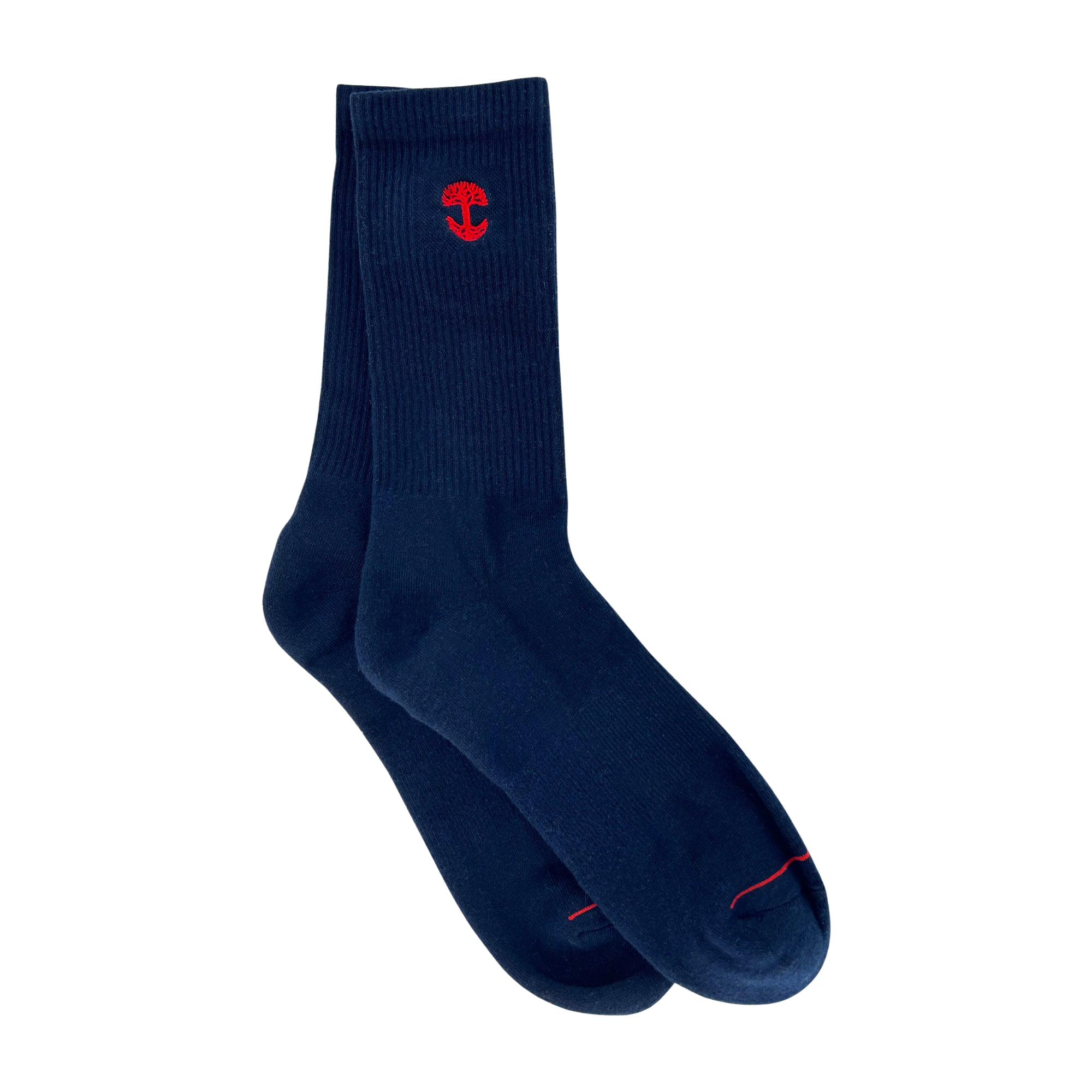 A pair of Embroidered Logo Socks from Oaklandish, in a deep navy blue color with a ribbed texture near the top. Each sock showcases a small red tree emblem, similar to the Oaklandish logo, near the cuff. The adult-size socks are slightly overlapped, with one sock's toe resting on the other's cuff, all set against a plain light grey background.