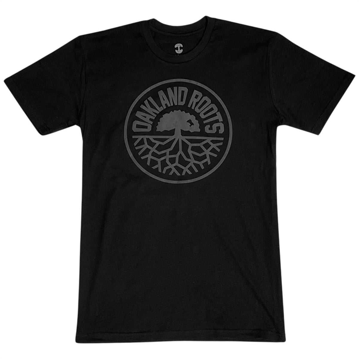 Introducing the Oakland Roots SC Blackout Logo Tee, a black T-shirt proudly featuring a circular emblem at its center. The text "OAKLAND ROOTS" is elegantly arched along the outer edge of the circle, enclosing an intricate illustration of a tree with expansive roots. This design symbolizes both Oaklandish pride and unwavering support for your favorite sports club. The dark-shaded design elements create a subtle yet striking contrast against the black fabric, making it a must-have for any fan.