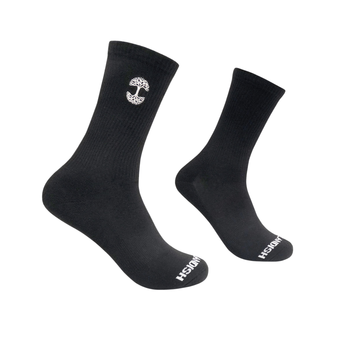 A pair of black Embroidered Logo Socks is shown against a white background. The Oaklandish logo, which resembles a tree, is featured on the outer side near the top. In adult sizes, the toe area displays "Oaklandish" in white lettering. The socks are ribbed at the ankle with a smooth texture on the foot.