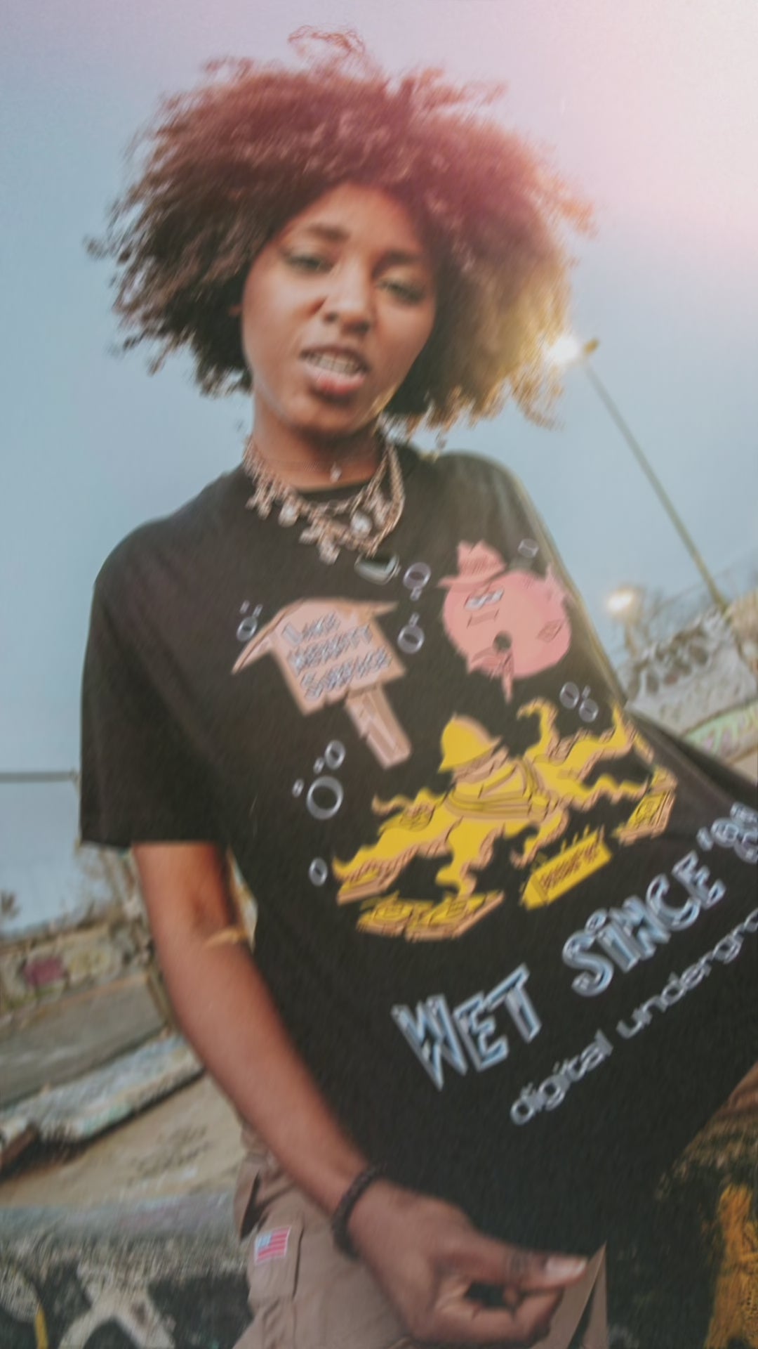 Video slideshow of images of models wearing the Digital Underground collection tees.