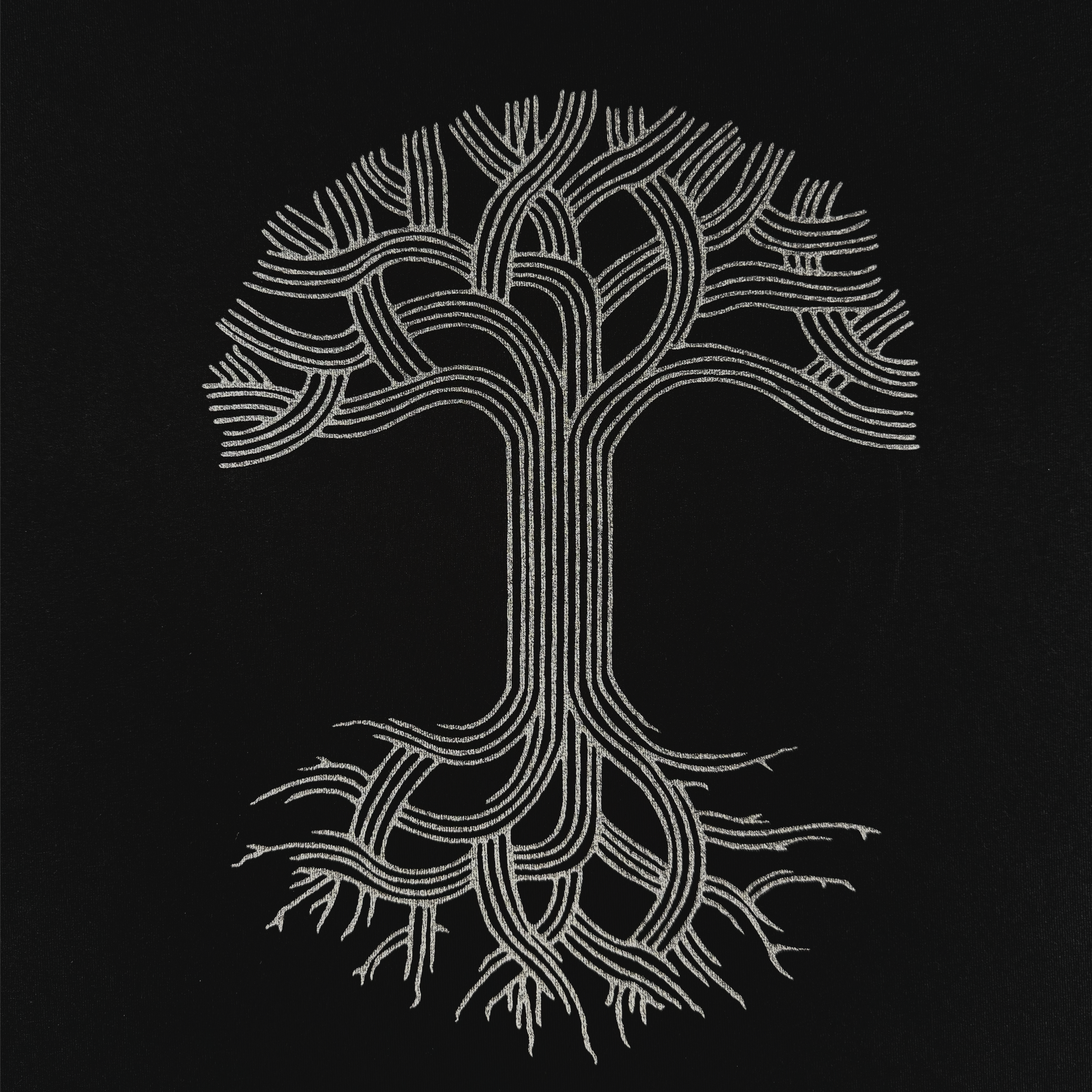 The Oaklandish Oakland Roots SC X Oaklandish Bootleg Tee features a white tree design on black, with symmetrical, intricate branches and roots inspired by the clean, modern style of iconic Oakland Roots and Oaklandish logos.