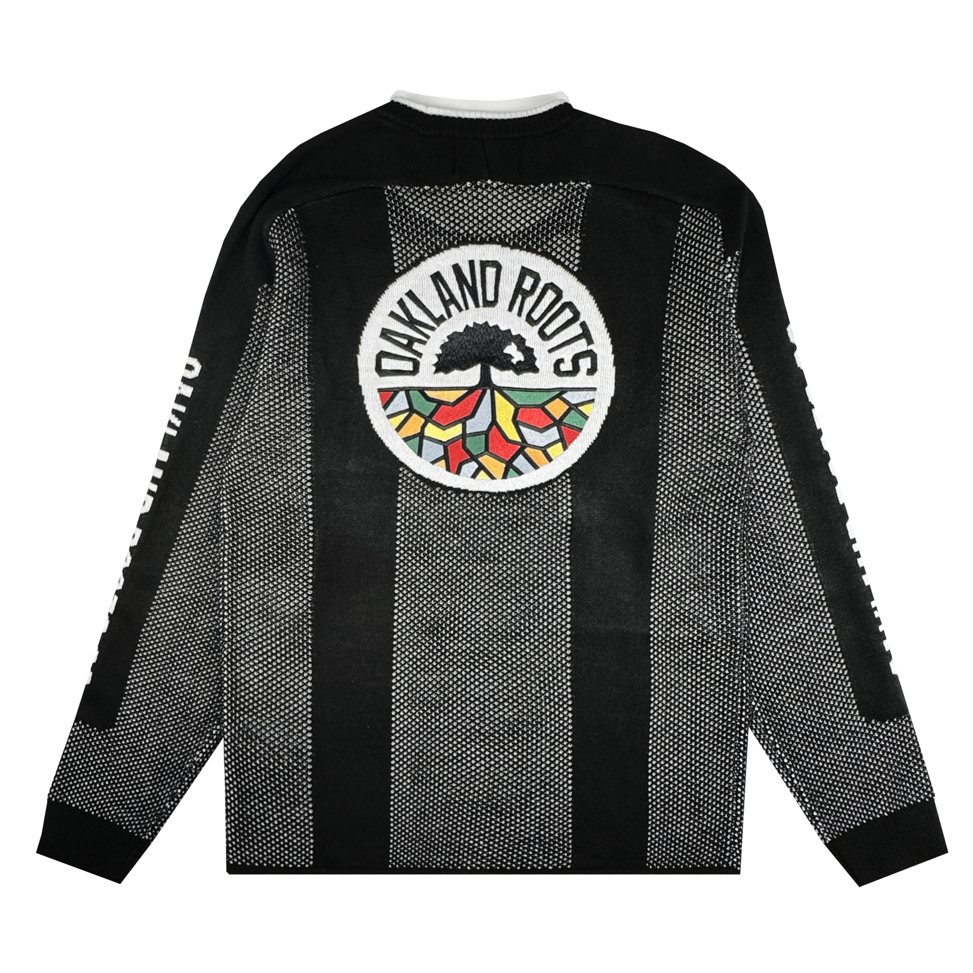 The Oakland Roots SC Clubhouse Sweater by Oakland Roots SC is a black knit with white dotted vertical stripes, a large circular tree-and-roots patch on the back, "OAKLAND ROOTS" text, and white sleeve accents.