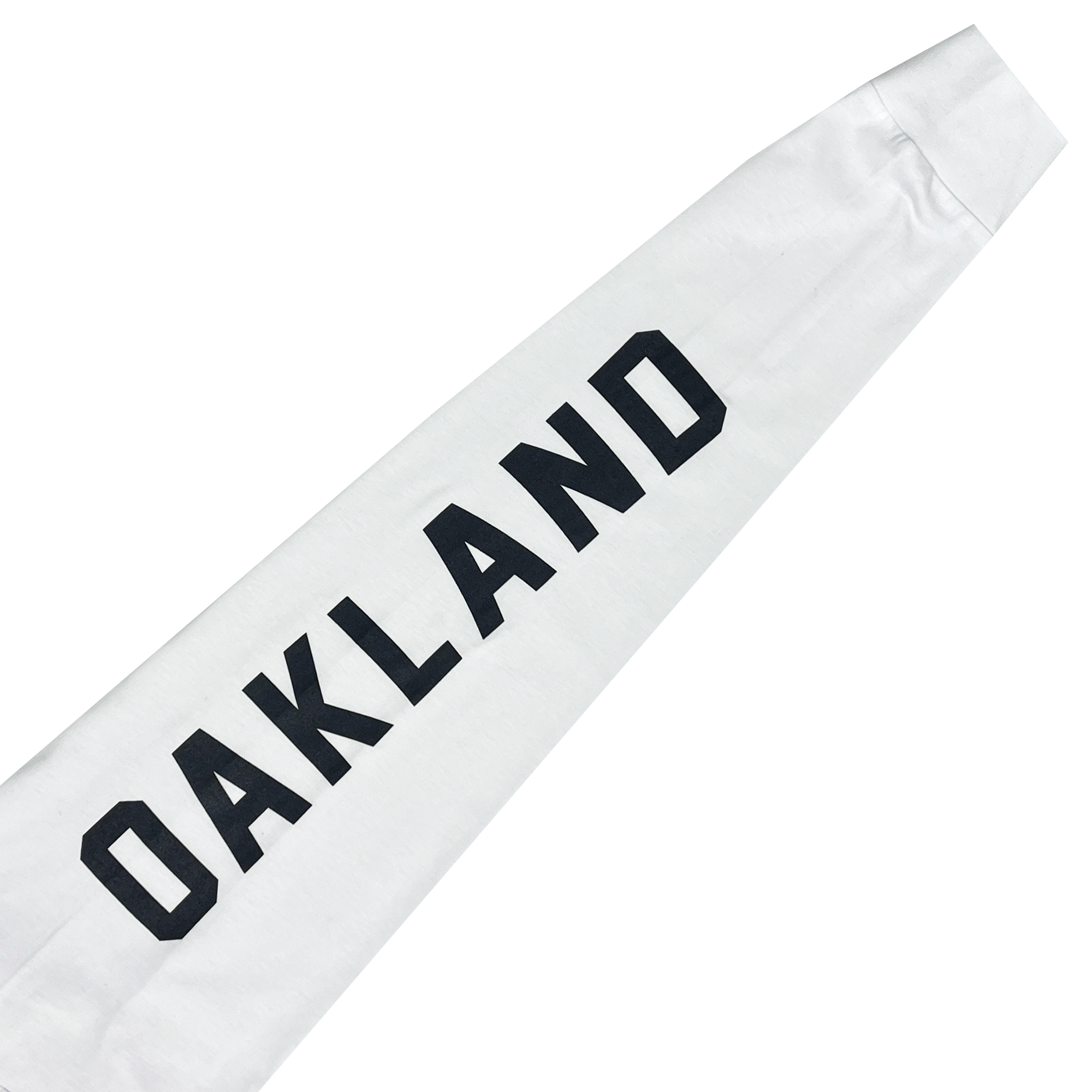 The Oakland Roots SC Classic 2.0 LS Tee is a white long sleeve t-shirt with "OAKLAND" printed in bold, black capital letters running diagonally across the design. Made from cotton, the sleeves end in cuffs. The simple and clean print contrasts strikingly against the plain white background, making it perfect for any Oakland Roots sports club fan.