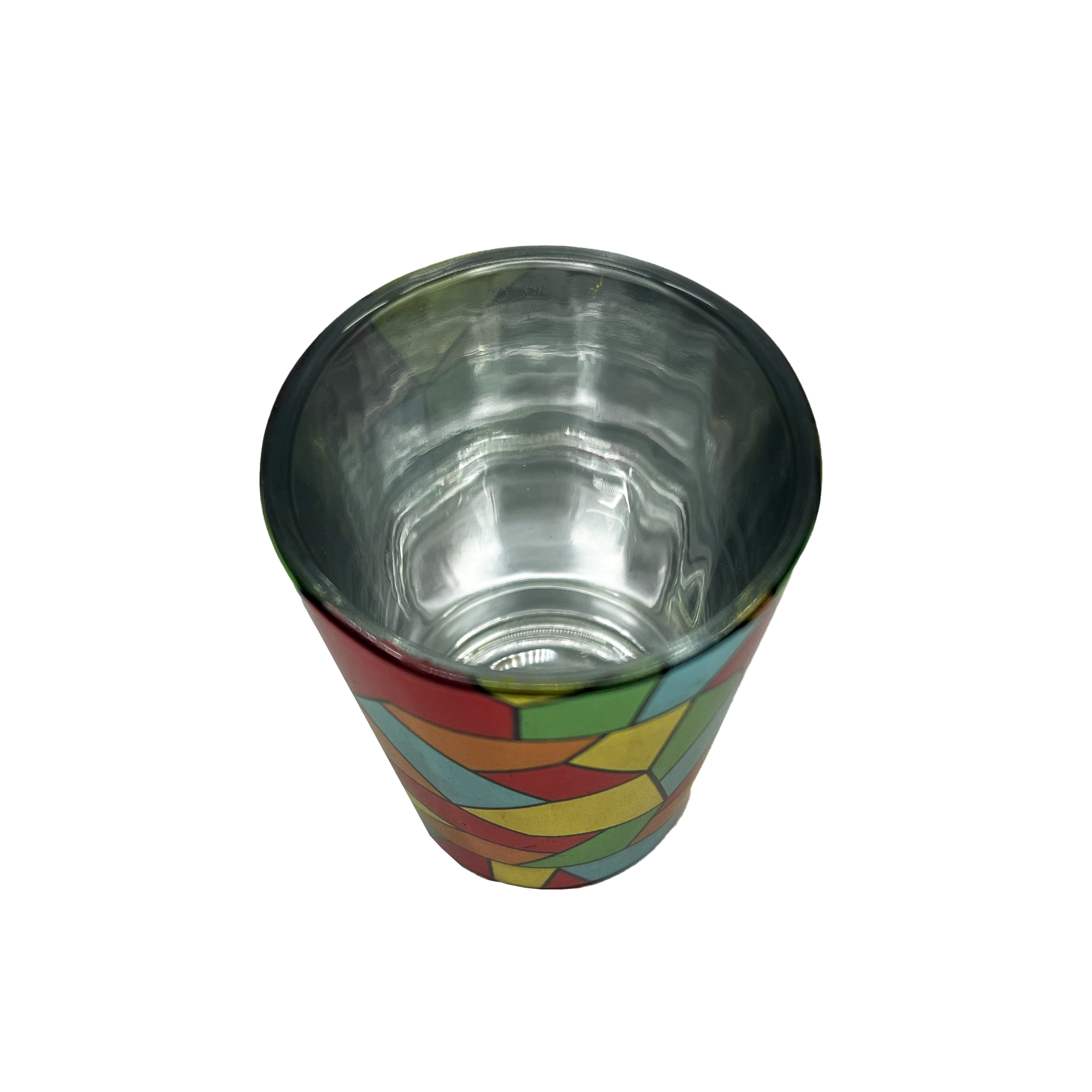 The Oakland Roots SC Mosaic Shot Glass by Oakland Roots SC is pictured. This small, metallic, cone-shaped shot glass boasts a colorful geometric pattern on its exterior, featuring red, yellow, green, and blue shapes. The interior is a reflective shiny silver. The empty cup is photographed against a plain white background.