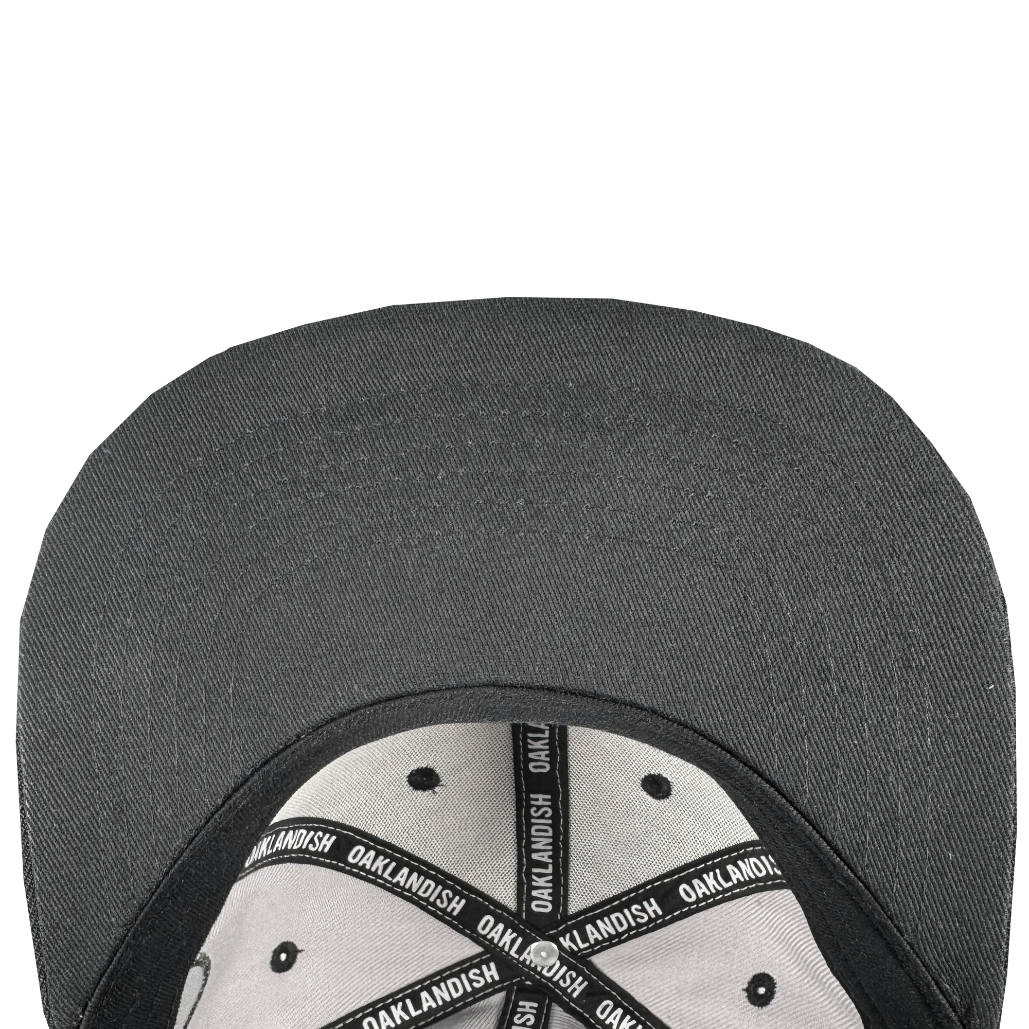 A top-down view of the underside of the Oakland Roots SC Arch Text Snapback shows black and white Oakland Roots SC branded taping, a gray interior, and black ventilation holes on the crown.