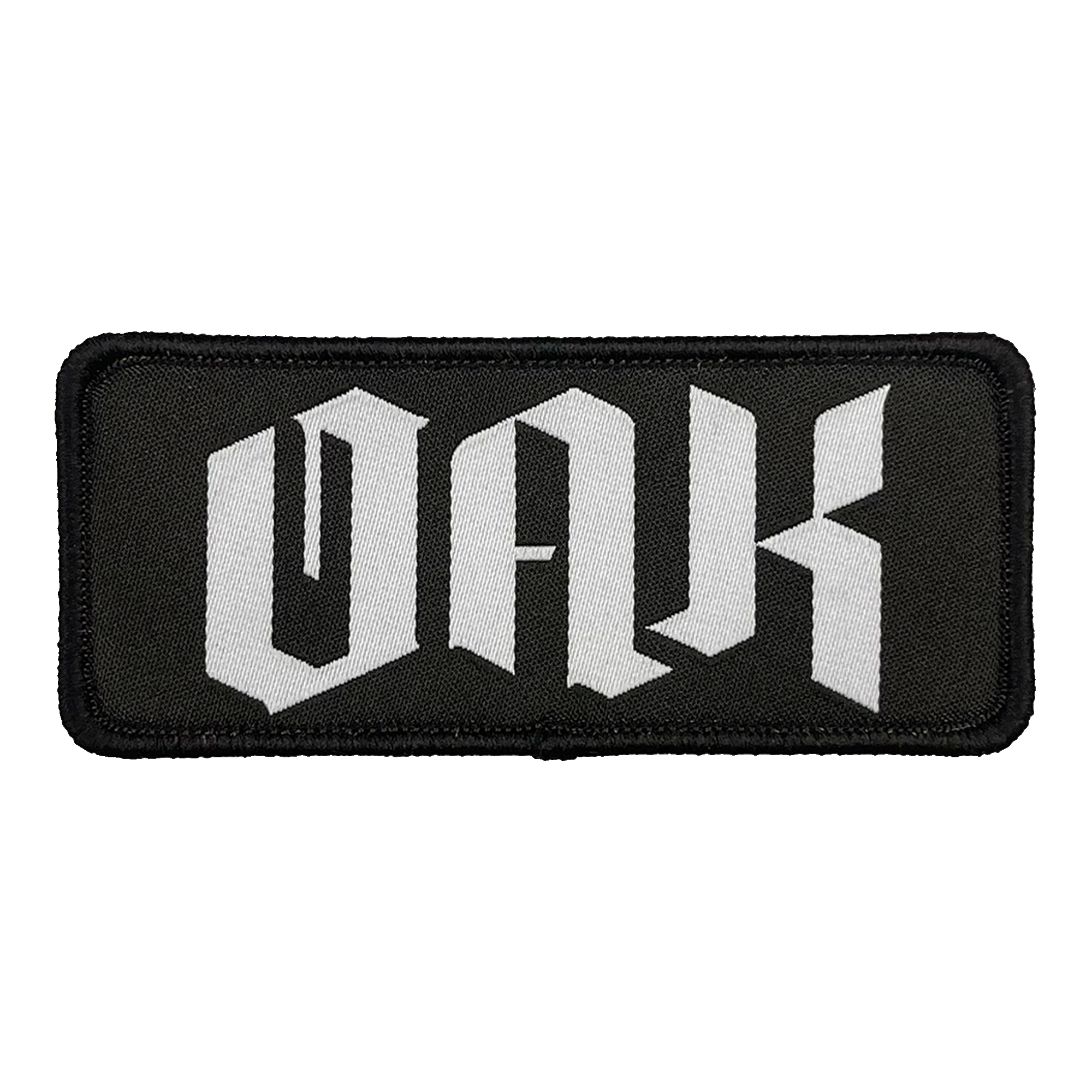 The OAK Official Patch by Oaklandish is a rectangular black emblem with a matching border and prominently displays the letters "OAK" in bold, white Gothic script. The intricate lettering evokes a medieval aesthetic, adding an element of classic elegance to your accessories. This embroidered iron-on patch offers a stylish touch to your collection.
