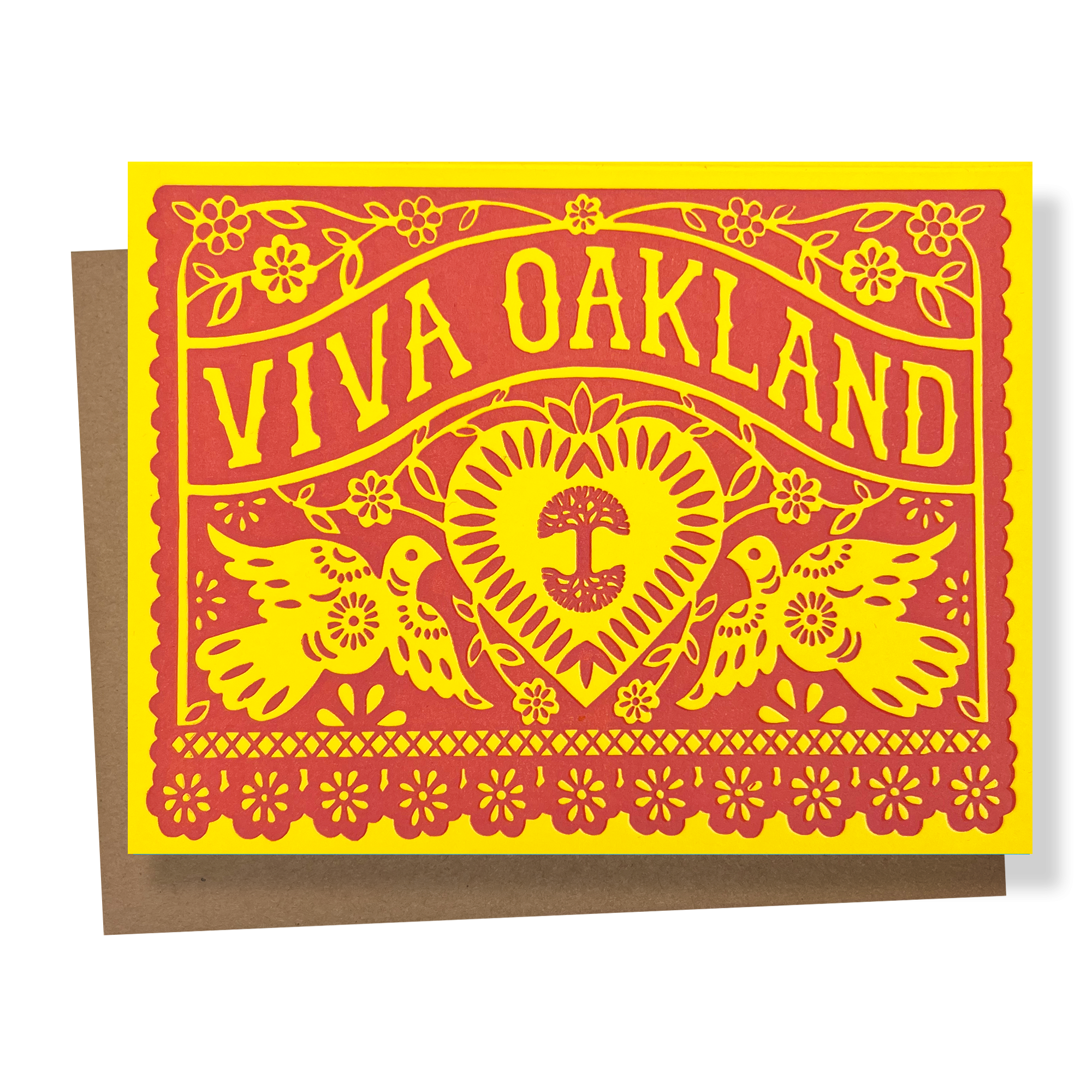 The Never Elsewhere Viva Oakland Card features a vibrant red and yellow color scheme on marigold cardstock, adorned with intricate patterns of flowers and birds. A central heart showcases a tree, while the top bears the text "Viva Oakland." The card is set against a recycled brown kraft paper background.
