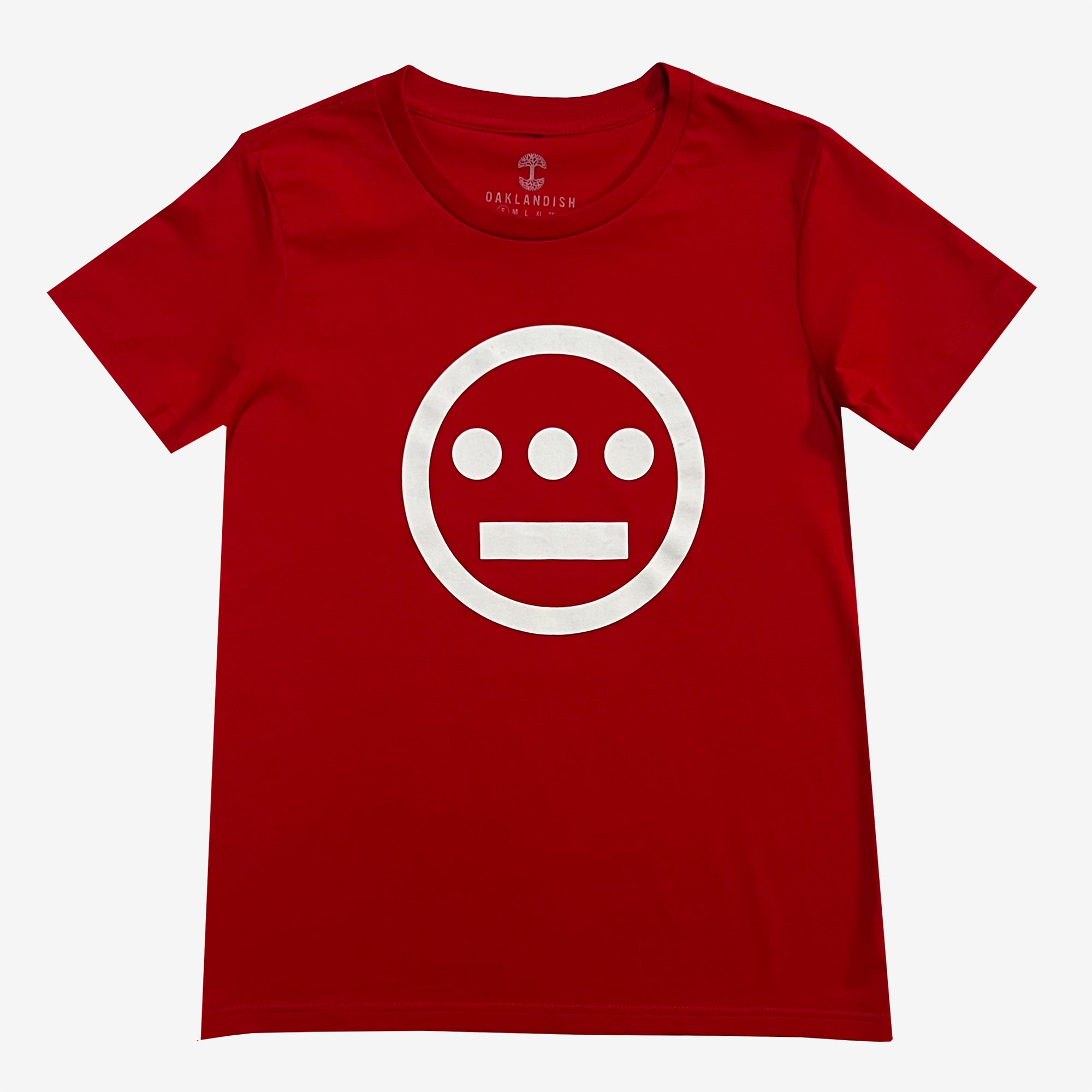 The Women's Hiero Classic Logo Tee by Hieroglyphics is a red, 100% cotton shirt featuring a simple white geometric design on the front. The design includes a large circle encompassing three dots arranged horizontally above a straight line. The crew neck tee is shown laid flat against a plain white background.
