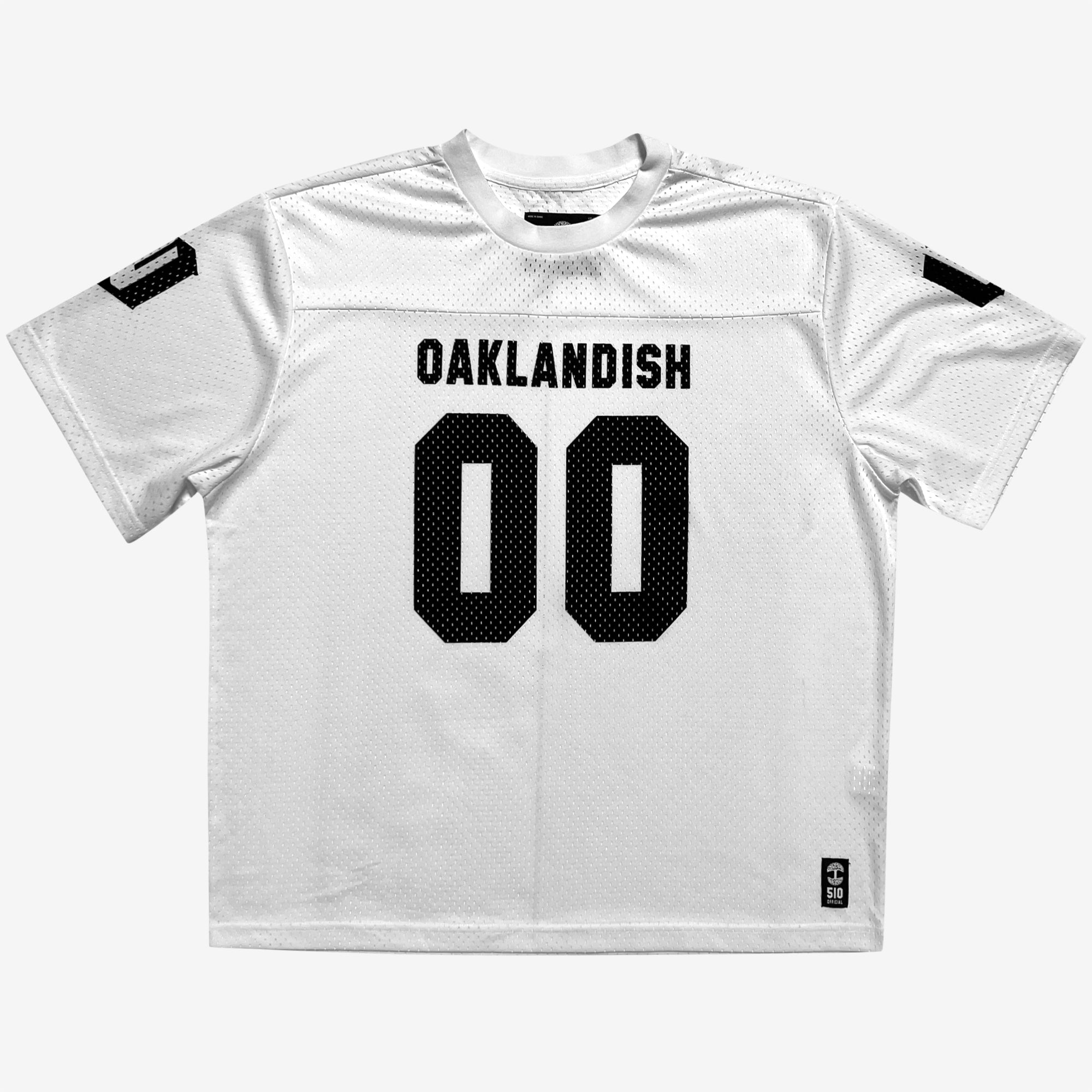 The Official Football Away Jersey by Other features a white, lightweight mesh design with "OAKLANDISH" and the number "00" in bold black letters on the front, matching black "00" on the sleeves, and a brand logo tag at the bottom.