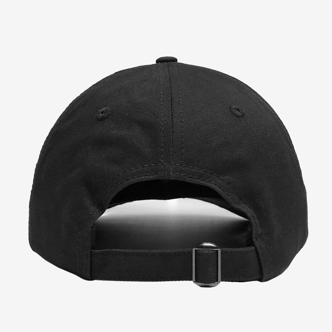 The image shows the back view of a Hieroglyphics Hiero Crew Dad Hat in black. The adjustable strapback features a fabric strap with a metal buckle for size adjustment and two embroidered ventilation eyelets on the sides. The hat's interior is partially visible through the opening. The background is plain white.