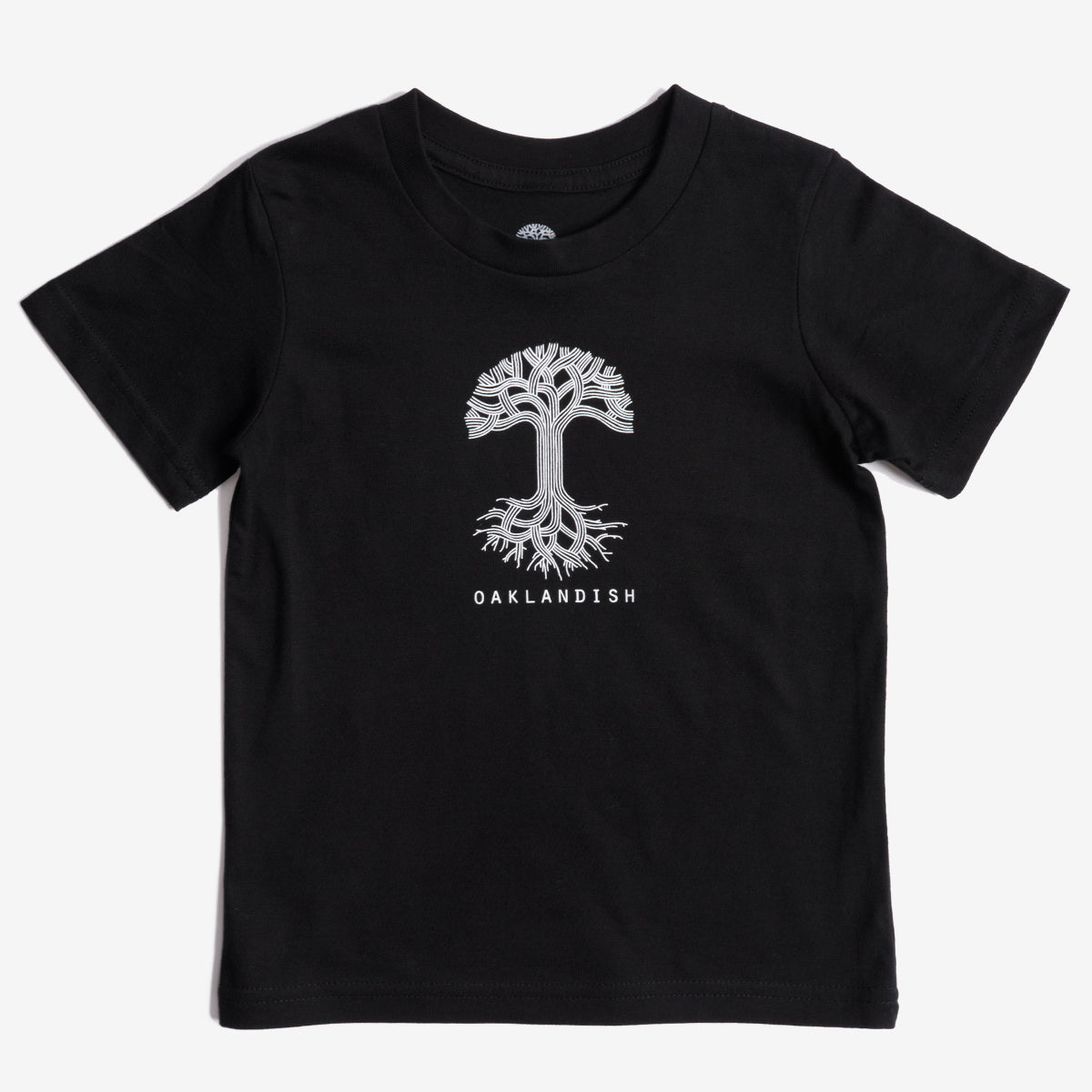 The Toddler Oaklandish Classic Logo Tee by Oaklandish is a black t-shirt featuring a white stylized tree graphic prominently on the front center. Below the tree, "OAKLANDISH" is printed in bold white capital letters. Made from 100% cotton, this comfy and stylish shirt provides an eye-catching contrast with its plain black background.
