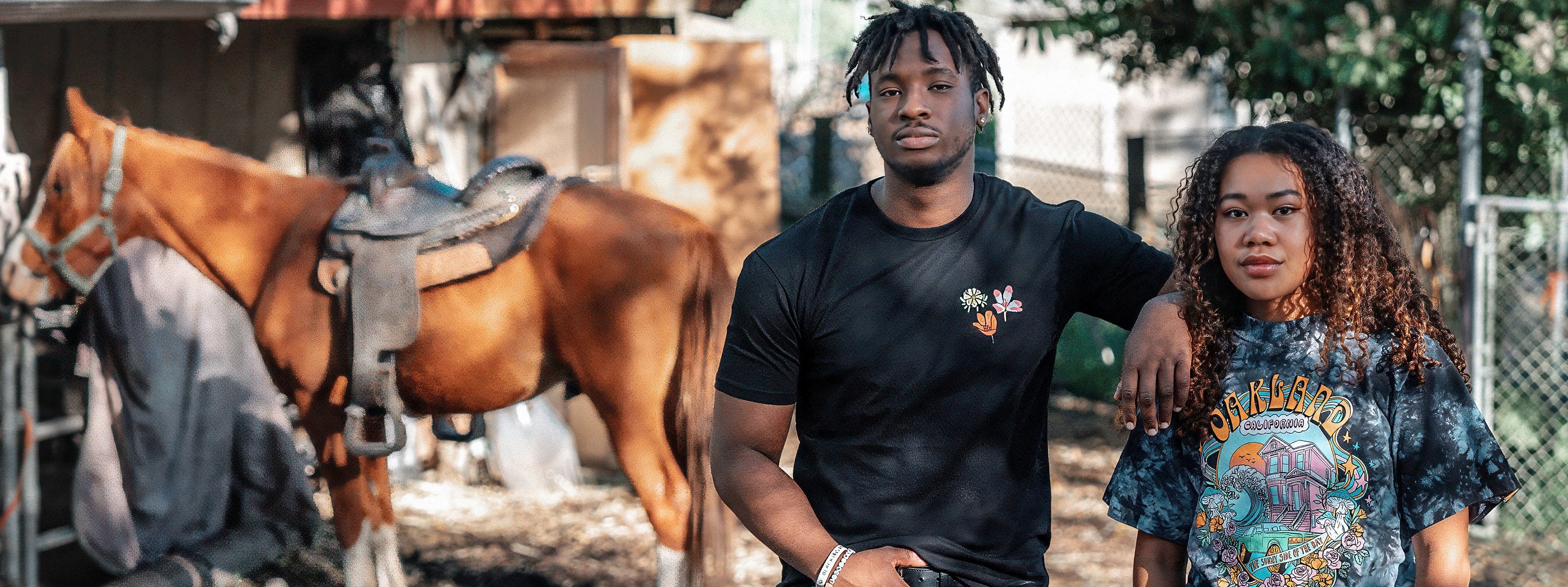 Model wearing natural viva Oakland tee.