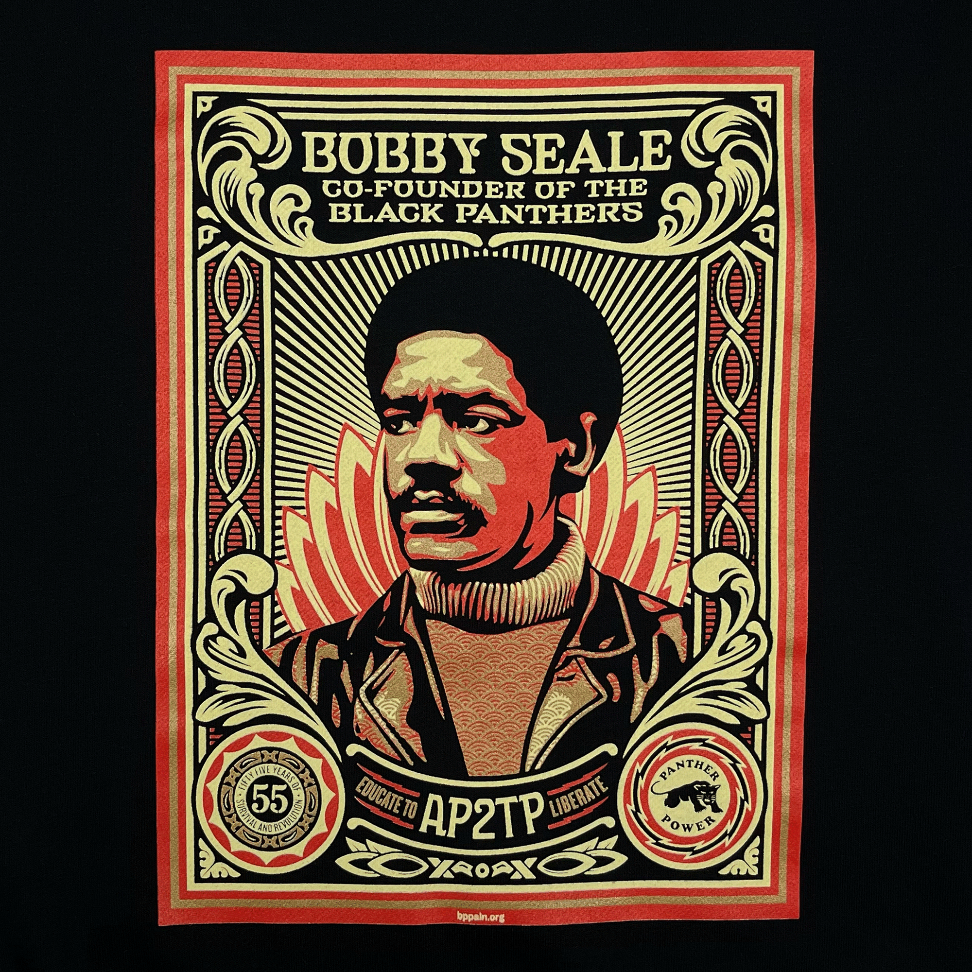 Close-up of the large illustrated graphic by Shepard Fairey, founder of Black Panthers, on a black limited edition hoodie. 