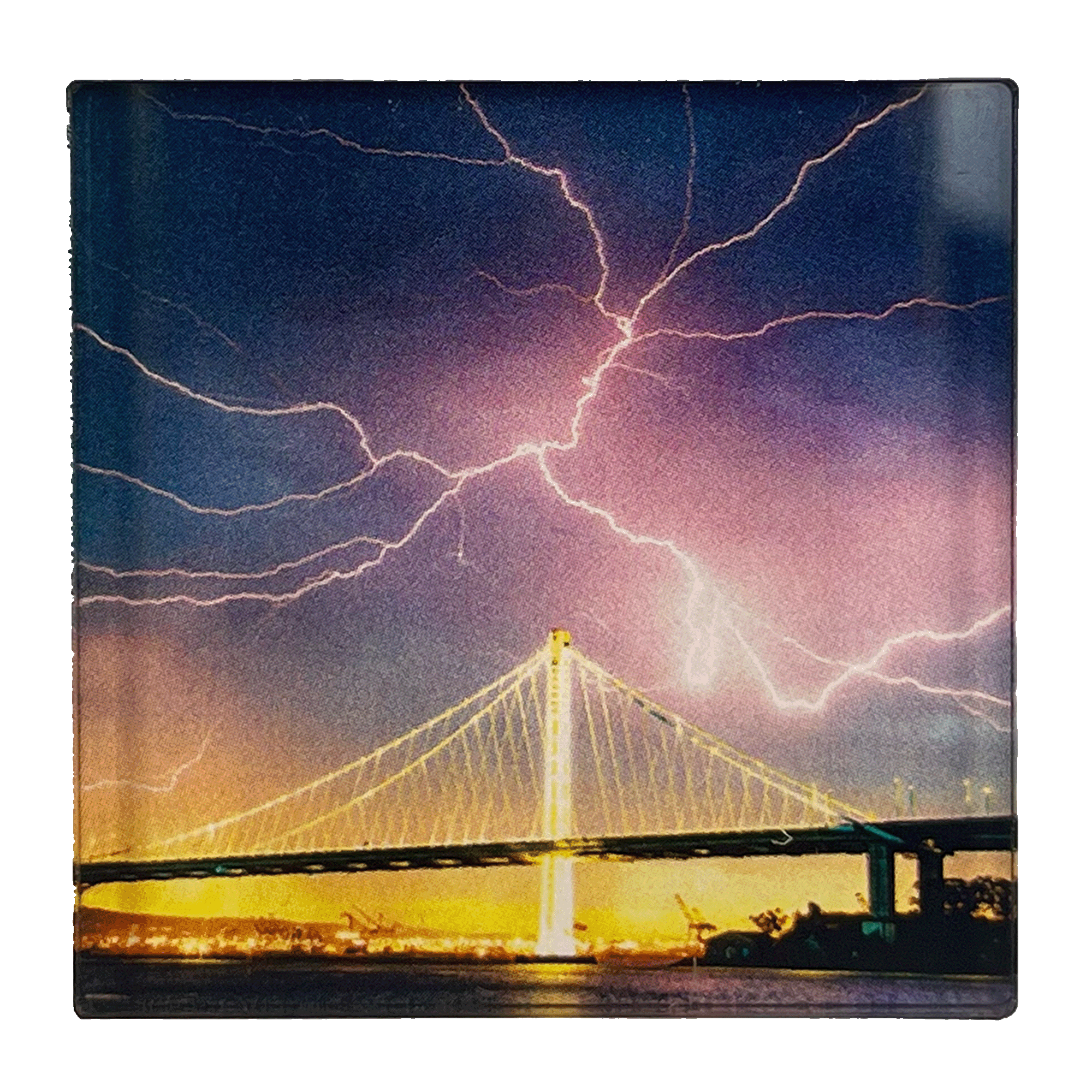 Image of lightning in night sky over Oakland bridge by photographer Vincent James. 