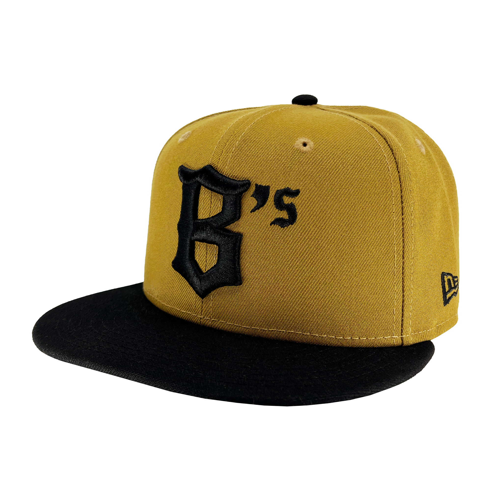 The New Era Oakland Ballers 59FIFTY Cap features a mustard-yellow body with a black flat brim. Adorning the front is an embroidered black shield with "B's" in stylized gothic script, representing the Oakland Ballers. The New Era logo appears on the left side in black, and both the top button and ventilation eyelets match in mustard yellow.