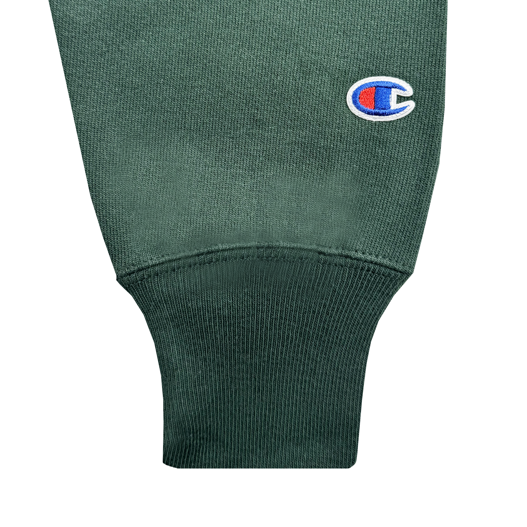 Close-up of a dark green sleeve with a ribbed cuff and visible fabric texture, featuring an embroidered blue, red, and white logo near the top—showcasing the Champion X Oakland Ballers Wordmark Hoodie from Oakland Ballers in the Pioneer League.