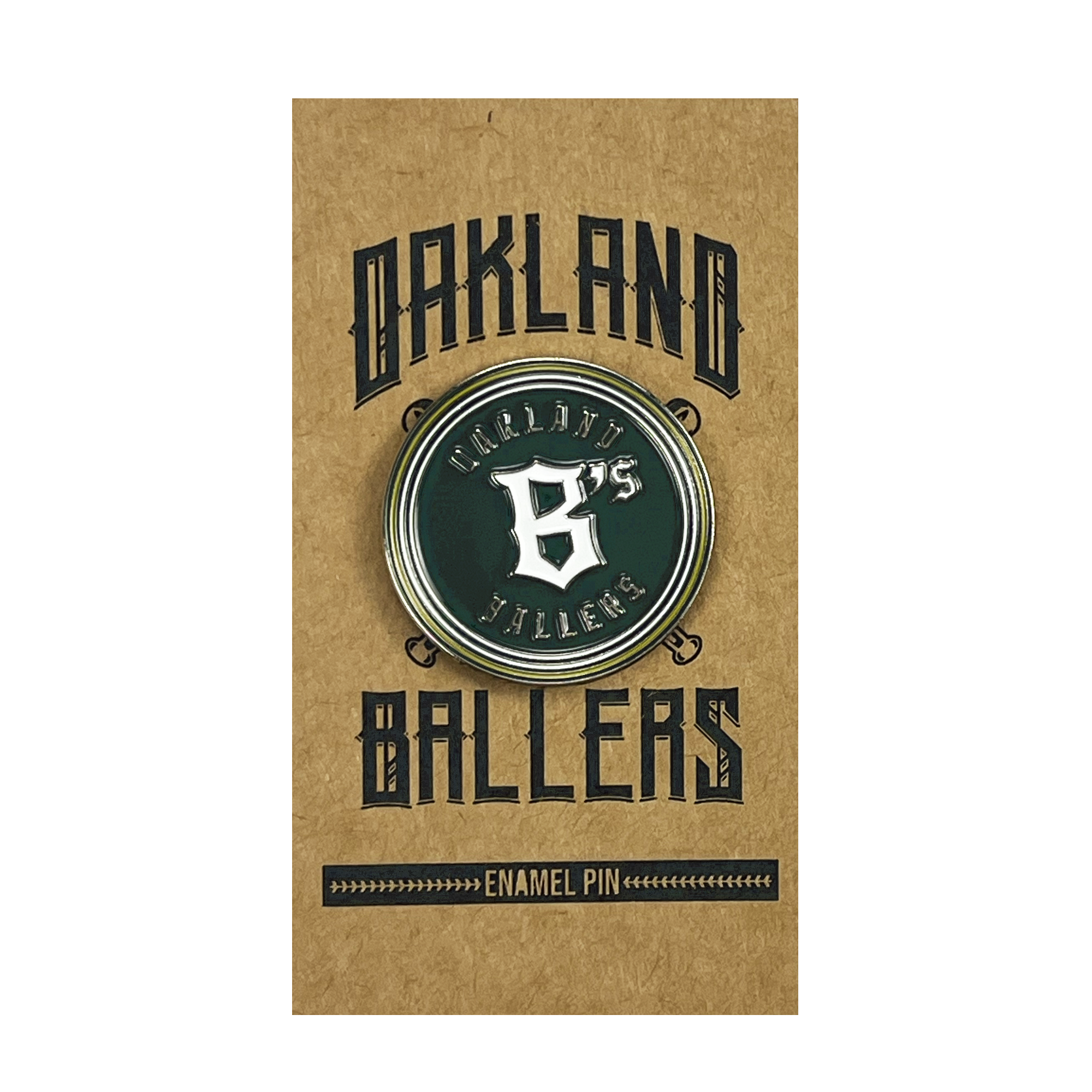 The Oakland Ballers Logo Enamel Pin features a round design with a green background, showcasing "Oakland Ballers" in white text along with a stylized "B." Representing Oakland's professional baseball team in the Pioneer League, the pin is attached to brown cardboard backing adorned with "Oakland Ballers" in an Old English-style font.