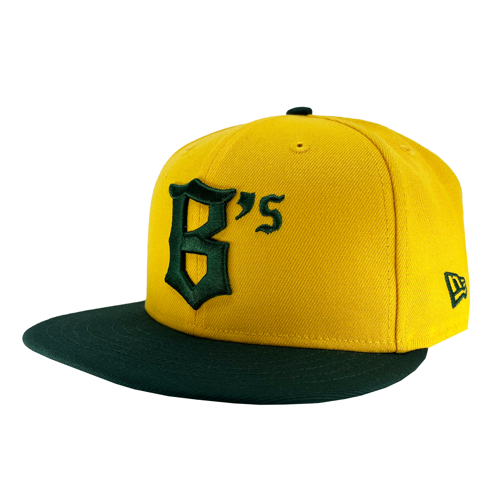 A yellow New Era Oakland Ballers 9FIFTY Cap with a dark green flat brim pays homage to the Oakland Ballers, a professional baseball team. The front features "B's" in gothic-style lettering in dark green, and the New Era logo is visible on the left side of this stylish tribute to Pioneer League flair.