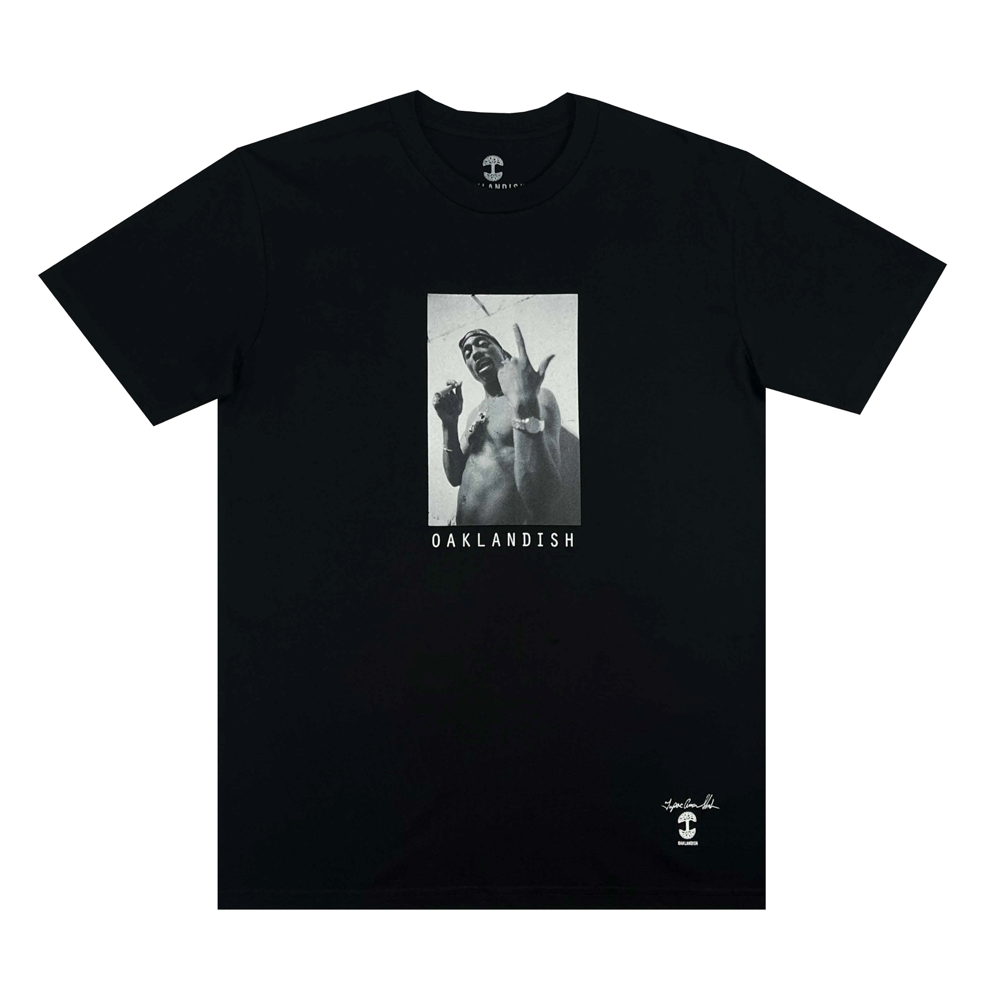 The Brighter Days Tee by Oaklandish is a black t-shirt from the hip-hop collection, showcasing a monochrome graphic of a person in a beanie and sleeveless top, smiling and holding up two fingers. The word "OAKLANDISH" is printed below the image, accompanied by a small logo and signature in the bottom right corner.