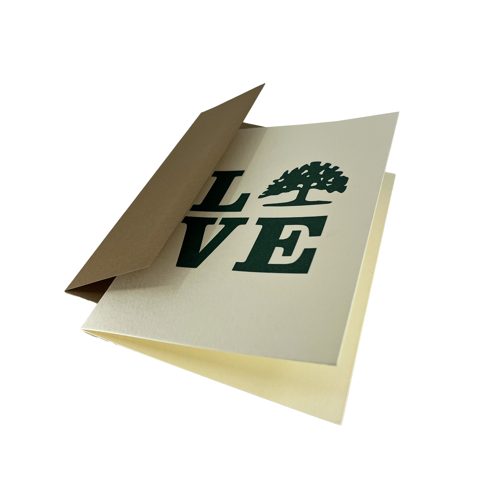 The Love Tree Card by Never Elsewhere, featuring a partially open design with a beige exterior and cream interior, displays the word "LOVE" in large, dark green letters on the inside. A tree replaces the letter "O," adding a unique touch to its elegant design. Crafted using letterpress techniques, the card rests on a white background.