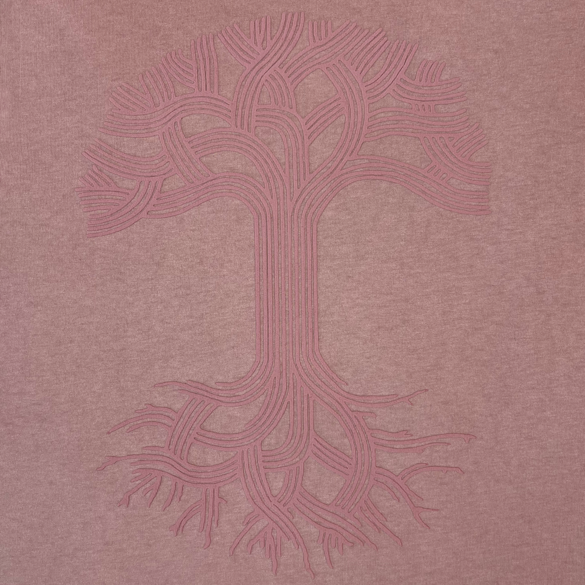 Show off heritage style in the Oaklandish Classic Logo Tee from Oaklandish, featuring their iconic stylized tree design—an abstract, symmetrical tree with an intricate trunk, curved branches, and roots rendered in continuous pink lines on a muted pink background. This men’s classic fit t-shirt is printed on heavyweight cotton for lasting comfort and durability.