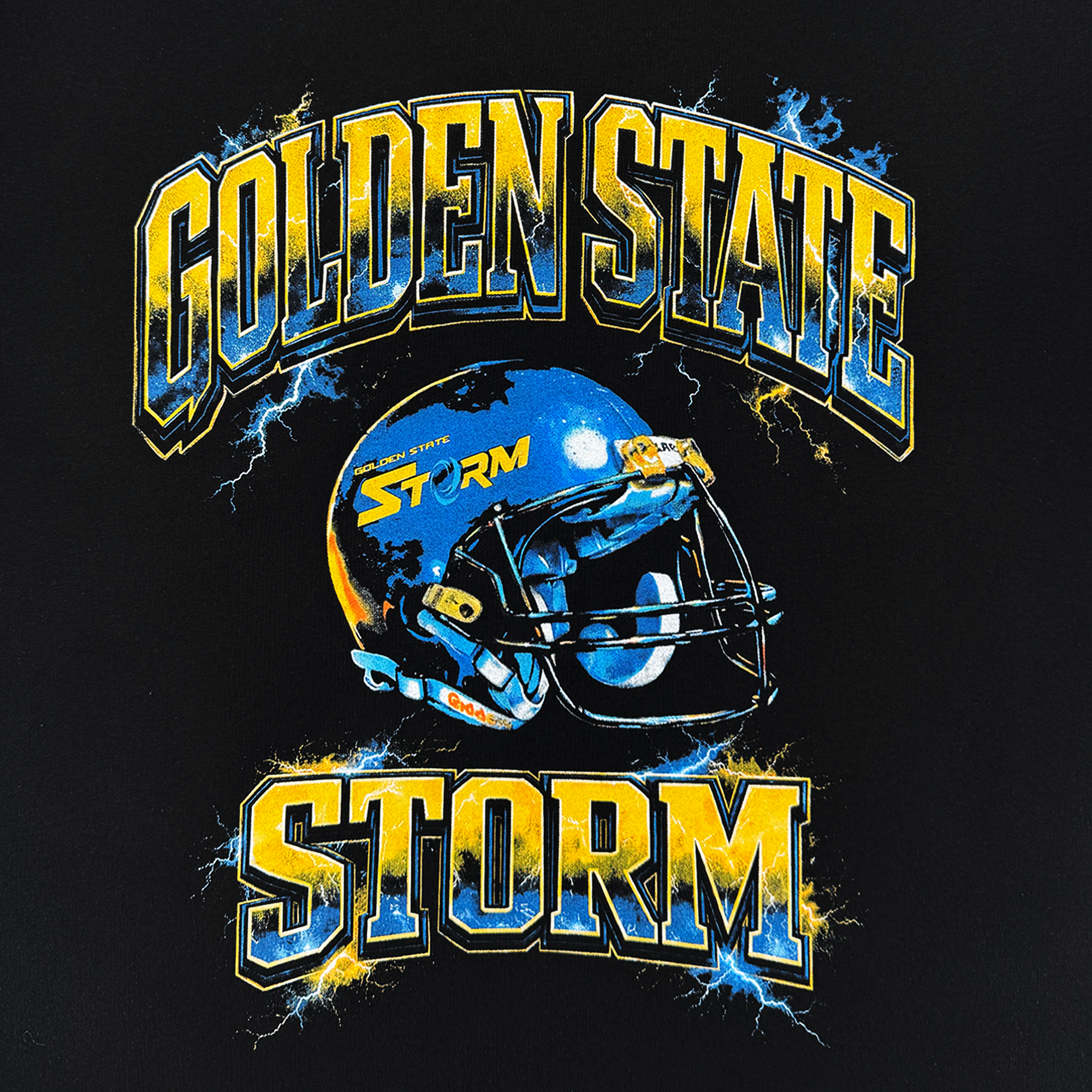 The Oaklandish Golden State Storm Y&B Tee is a men’s black heavyweight cotton shirt with a blue and yellow helmet and "STORM" design, framed by bold "GOLDEN STATE" and "STORM" text with lightning effects.