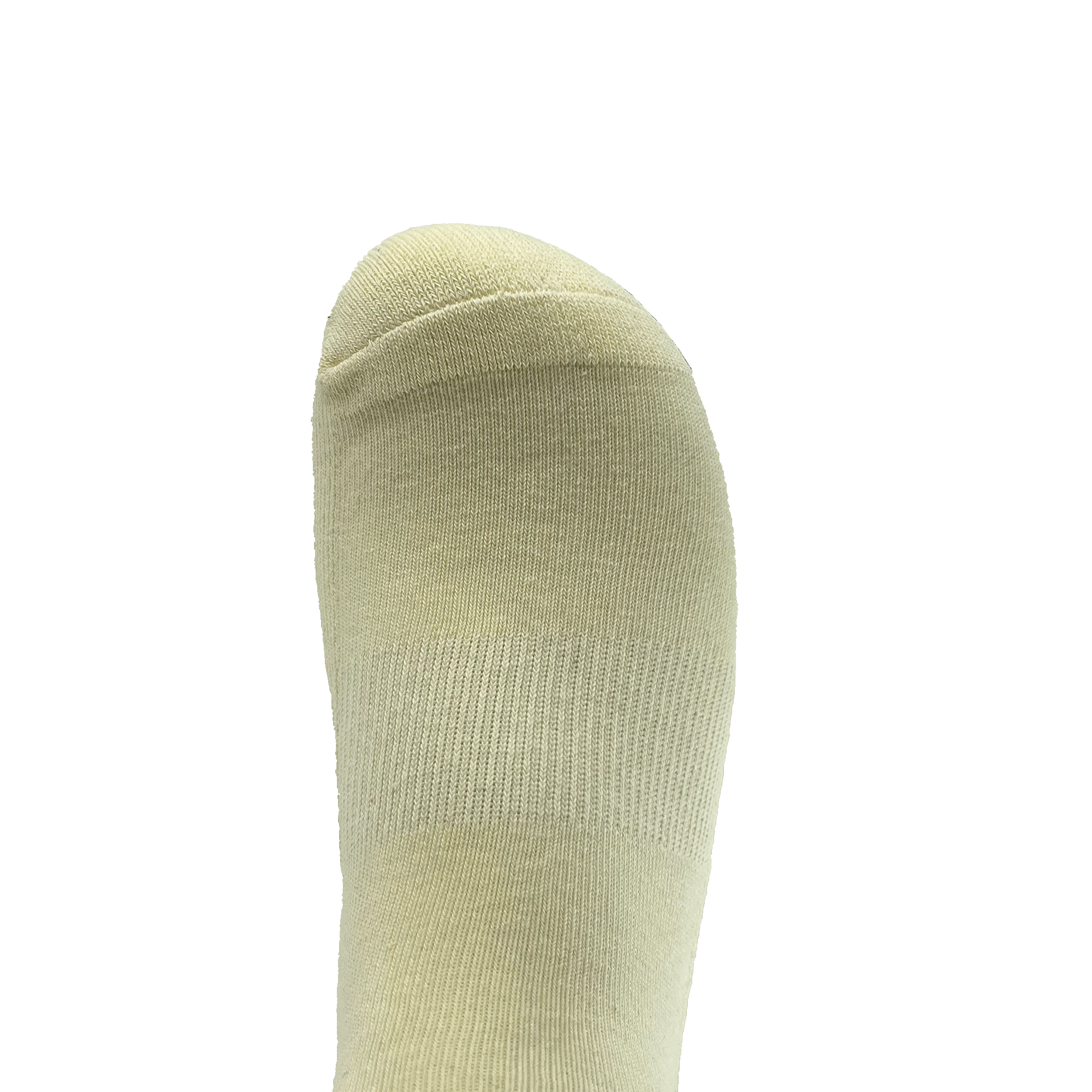 A close-up view of a foot wearing an Oaklandish Kanji Sock in beige, shown from above. The sock, available in adult sizes, covers the entire foot with subtle ribbing around the toe area and features a smooth texture. The background is green.