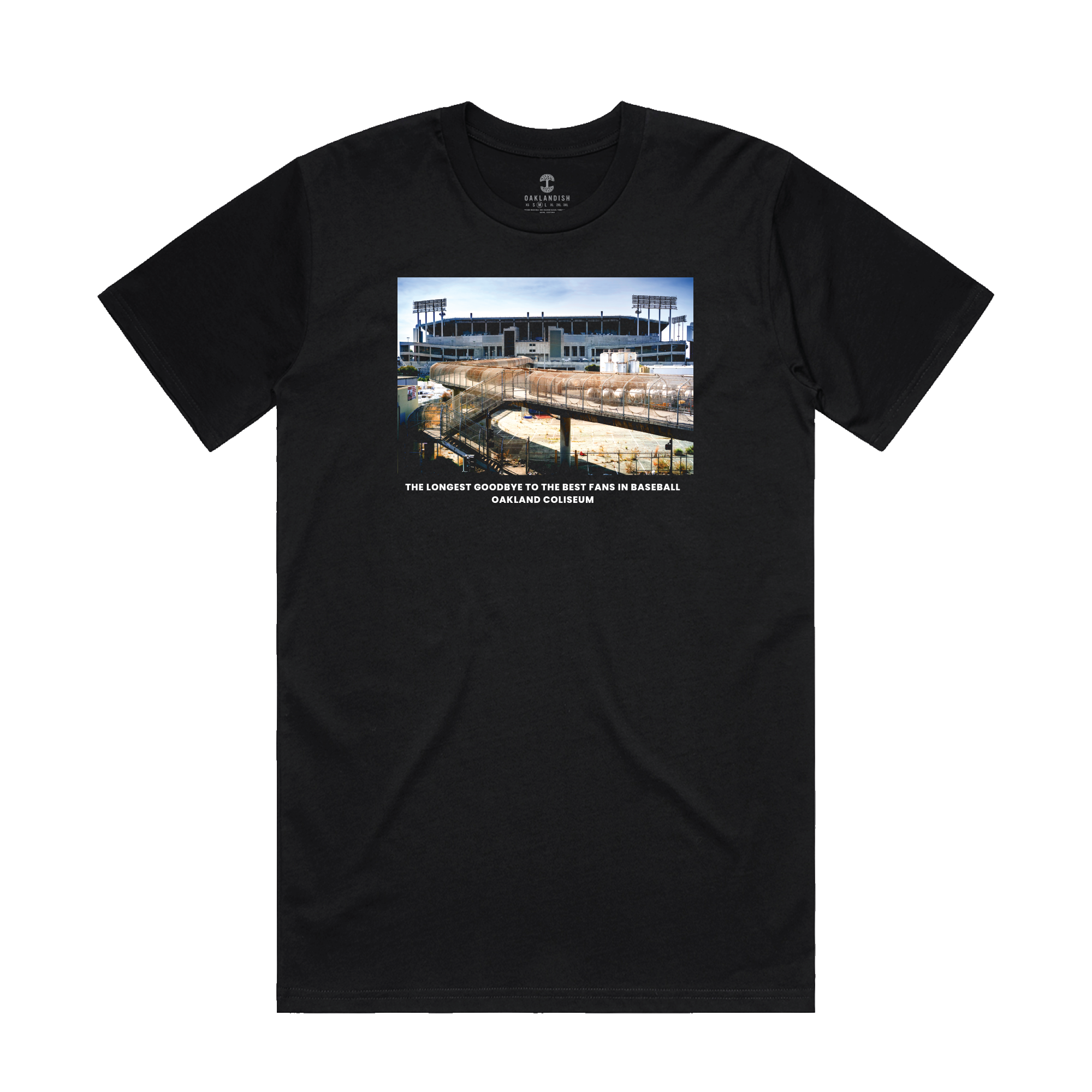 The Oaklandish "The Longest Goodbye" exclusive black tee showcases a rectangular photograph of a baseball stadium, likely during a game. Below the image, white text reads: "The Longest Goodbye to the Best Fans in Baseball." Perfect for lively tailgate parties with $2 beers, this T-shirt features a simple crew neck design and appears to be made from soft fabric.