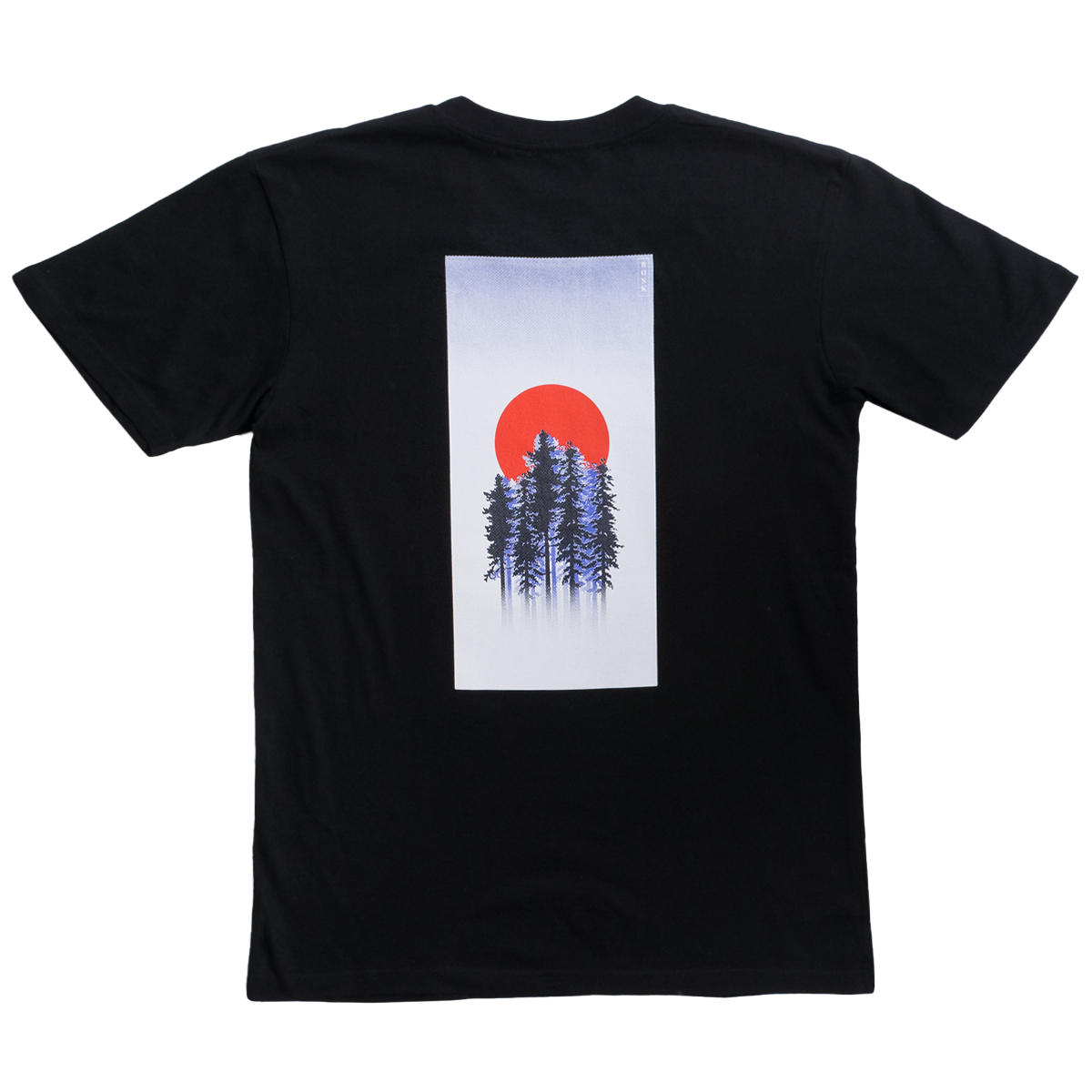 Introducing the Misty Tee by BOSK: This black, classic fit, heavyweight cotton T-shirt features a rectangular graphic on the back. The design showcases silhouetted trees against a gradient backdrop with a large red sun overhead, creating striking contrast. Its minimalist style beautifully emphasizes nature and simplicity.