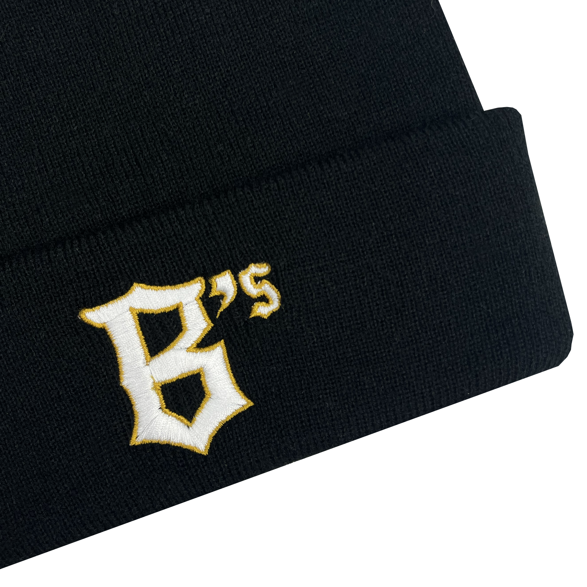 The Oakland Ballers Logo Beanie, a black knit beanie, features the embroidered letters "B's" in a stylized yellow and white font on the cuff, reminiscent of a professional baseball team logo. The plain white background highlights the beanie.