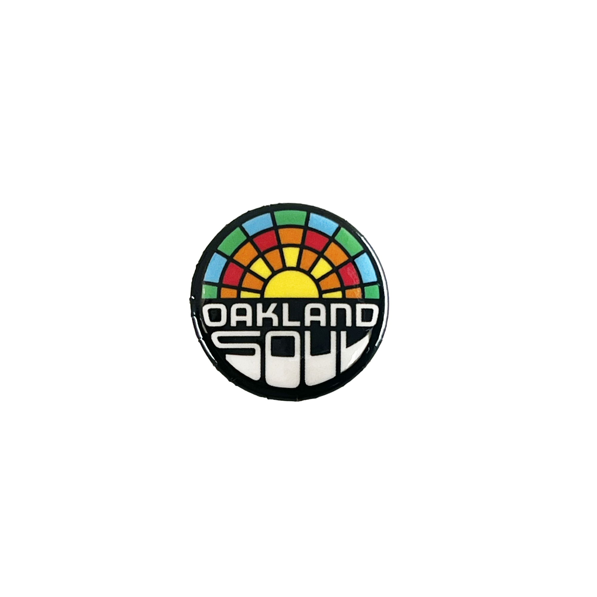 The Oakland Soul Pin features a vibrant design with a yellow sun at the center, radiating rainbow-colored segments. Below the sun, bold white text reads "OAKLAND SOUL," paying homage to Oakland's USL W-League women's soccer team. The background is black.