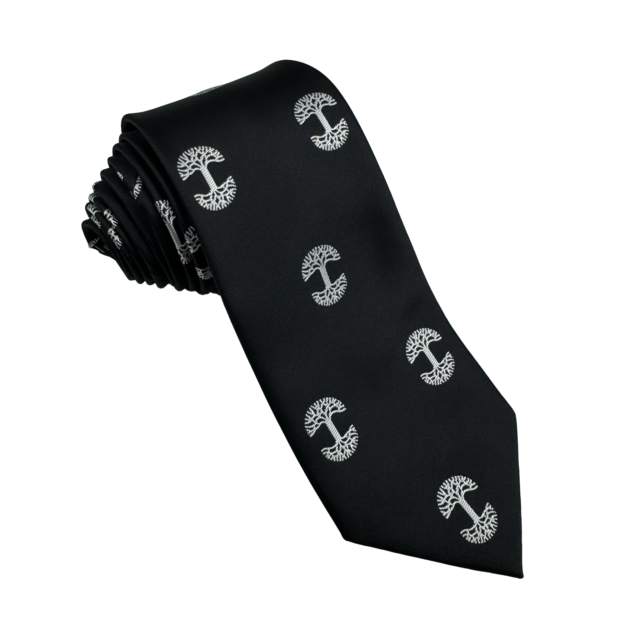 The Oaklandish Logo Tie by Oaklandish, crafted from black polyester and adorned with white tree motifs that evoke the iconic Oaklandish tree logo, showcases intricate branches and roots. Rolled neatly, its symmetrical pattern exudes classic elegance, making it a perfect accessory for any formal occasion.