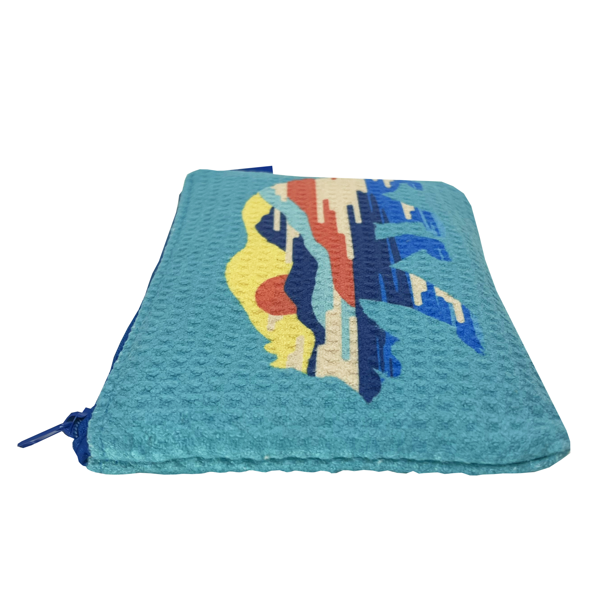 The Sunset Bear Pouch by Oaklandish is displayed horizontally. It has a textured waffle weave and comes in light blue with a vibrant, abstract design on the front, featuring a red sun setting over blue and yellow mountains. The zip pouch features a zipper closure along the side in matching blue color.