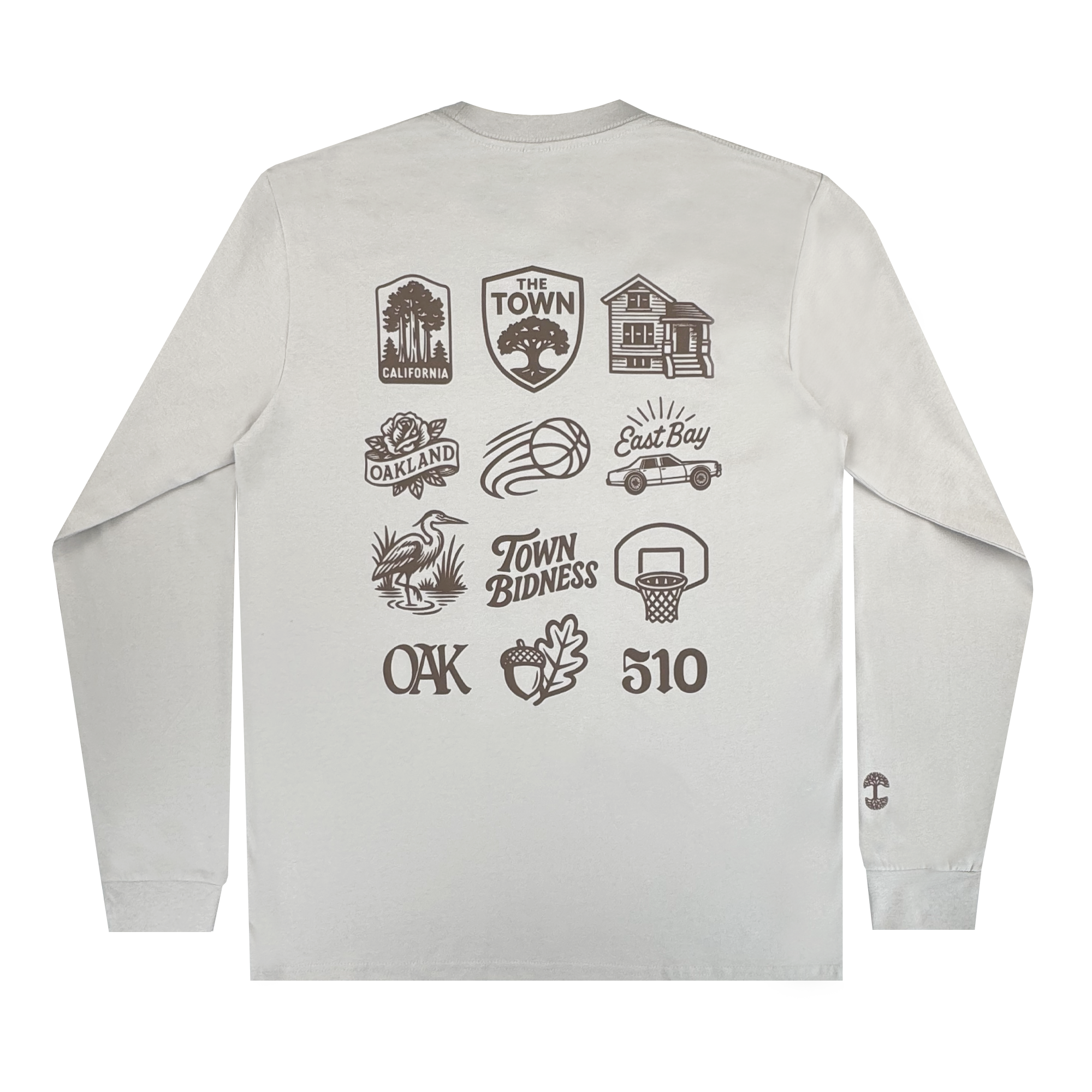 The GSW Pirate Black-Letter LS Tee is a light gray long-sleeve shirt with black graphics on the back, featuring Oakland, “Town Bidness,” a basketball, and Golden State Warriors-inspired Oaklandish Town Collection designs.