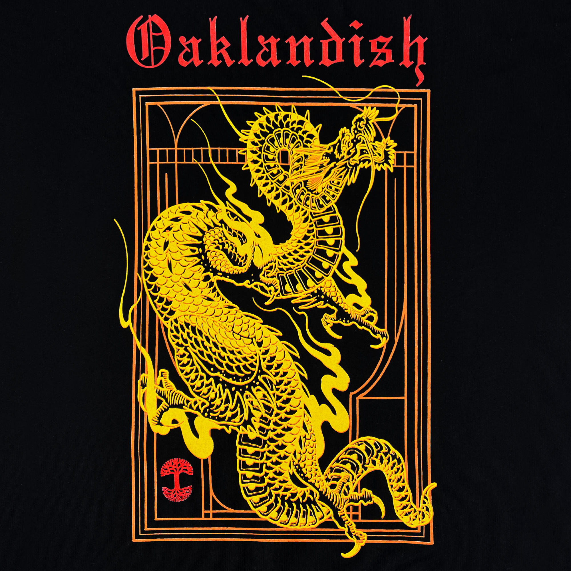 The Women's Prosperity Tee from Oaklandish showcases an intricate design on a black background featuring a yellow dragon and tiger facing off, symbolizing prosperity and peace. Above the battle, "Oaklandish" is written in a bold, red Gothic font. The design is framed by stylized lines with a red emblem below the animals on this 100% cotton women's t-shirt.