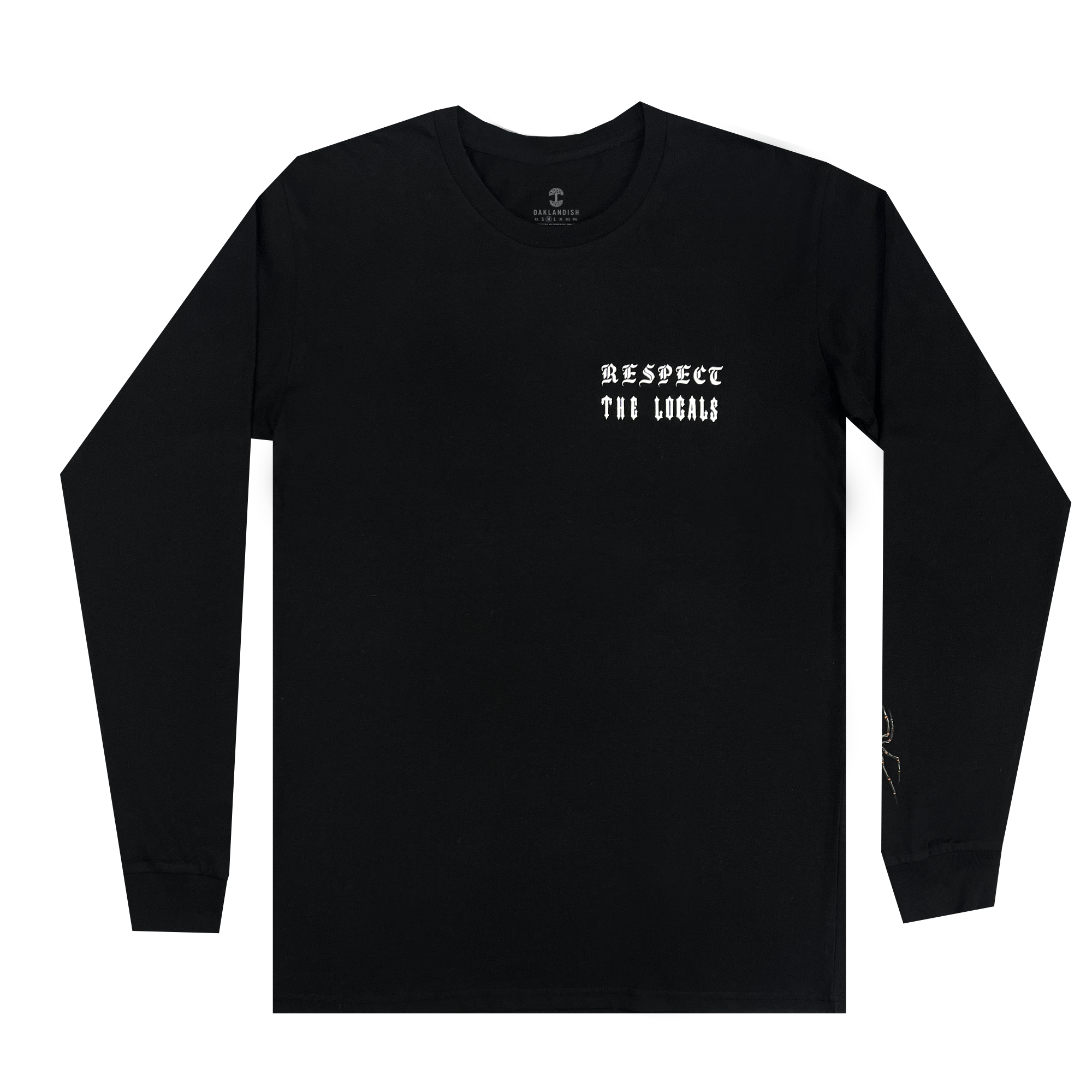 The Respect the Locals LS Tee by Oaklandish is a black, 100% cotton long sleeve t-shirt featuring white text on the upper left chest area. The text reads "RESPECT THE LOCALS" in a stylized font reminiscent of a tattoo artist's work. The shirt has a crew neck and ribbed cuffs, with no other designs or patterns visible.