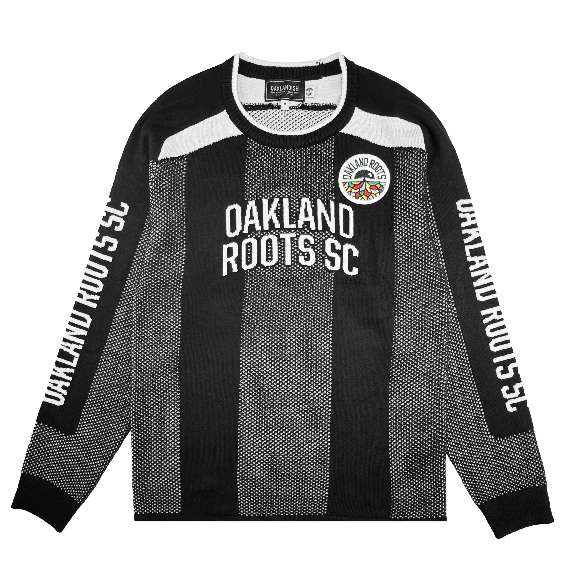 The Oakland Roots SC Clubhouse Sweater is a black long-sleeve by Oakland Roots SC featuring white "OAKLAND ROOTS SC" text on the chest and sleeves, vertical dotted stripes, a club crest patch, and black-and-white collar and cuffs.