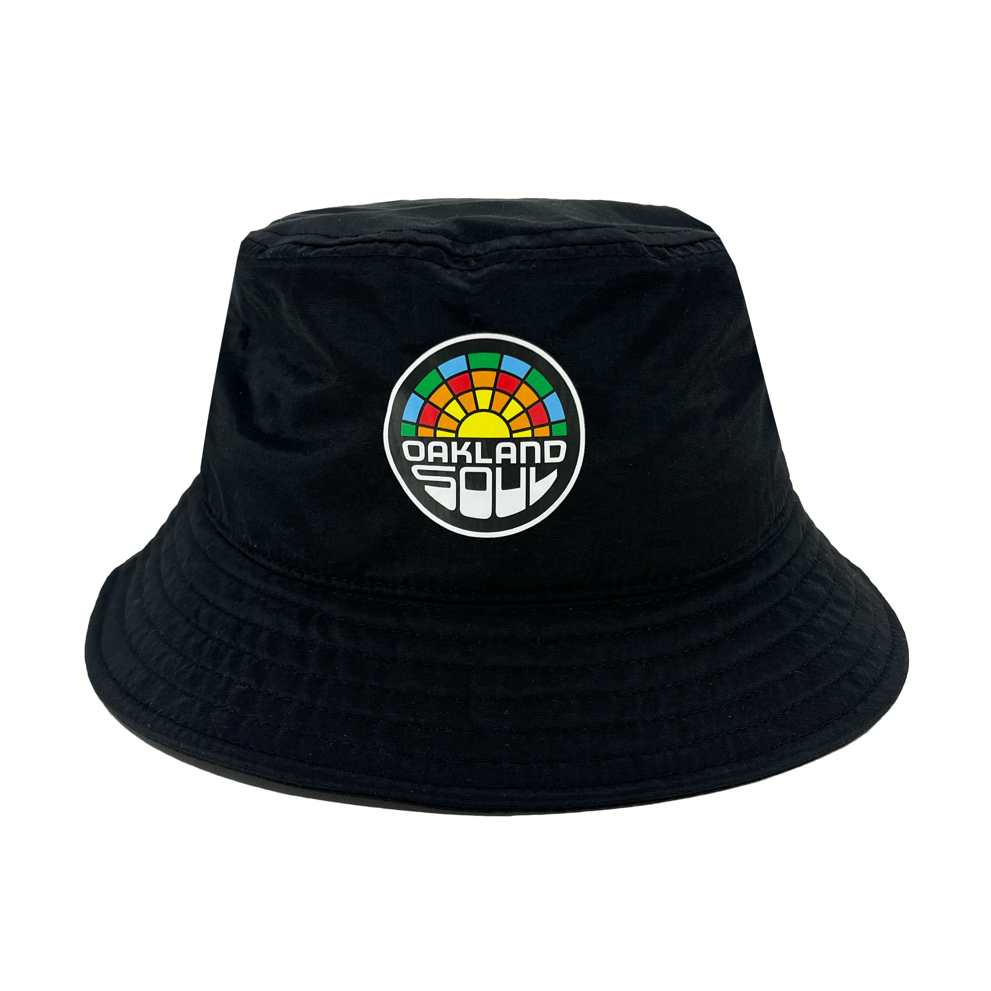 Check out the Oakland Soul Logo Bucket Hat, a stylish black bucket hat adorned with the Oakland Soul logo on the front. The vibrant, multi-colored semicircle evokes a rainbow, with "OAKLAND" displayed prominently in bold white letters and "SOUL" in smaller white letters beneath it. Show your support for this inspiring women's soccer team in the USL W-League!